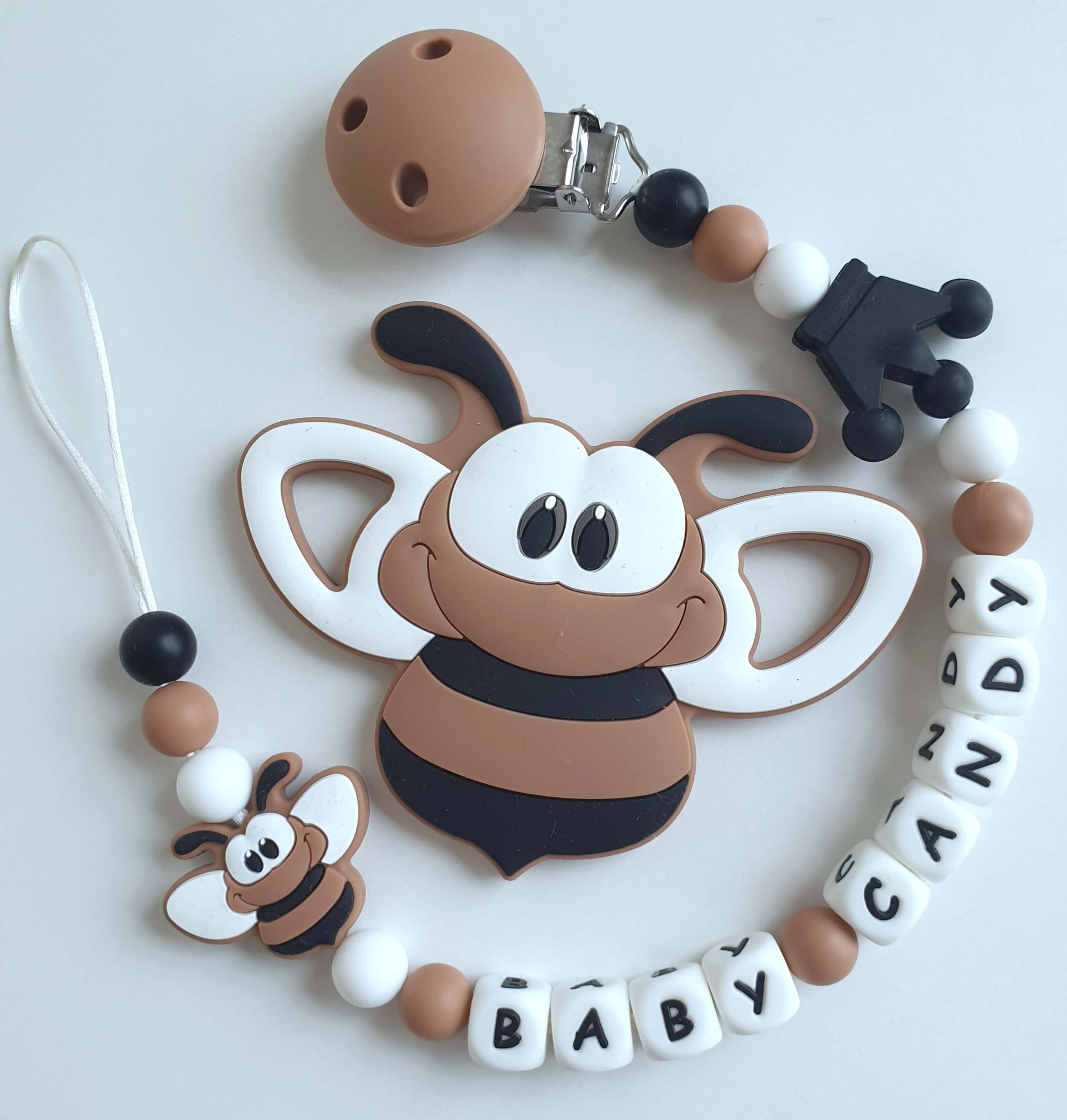 Silikoninis čiulptuko laikiklis su vardu ir kramtukas Bitutė