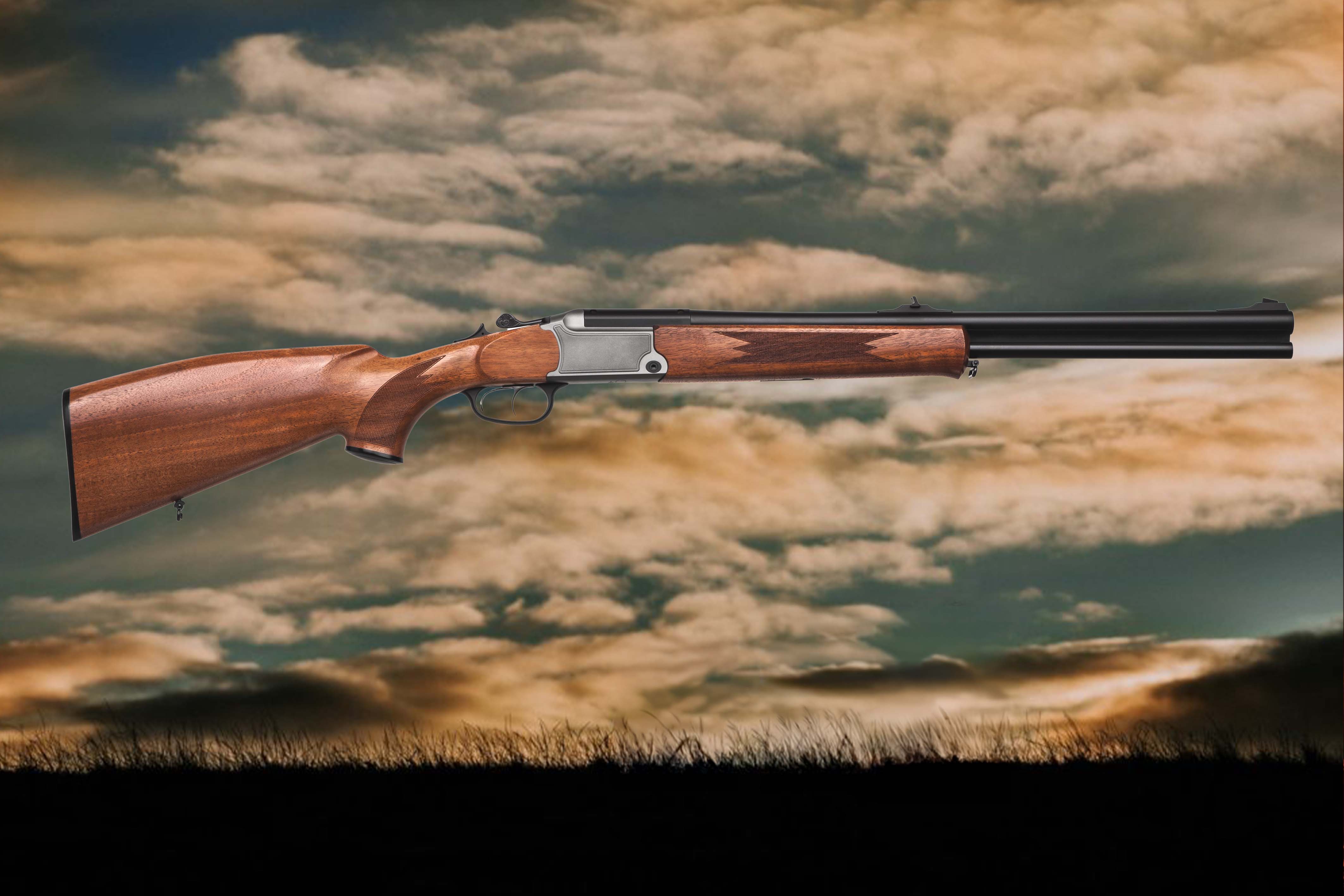 124 Double Barrel Shotgun and Evening Sky