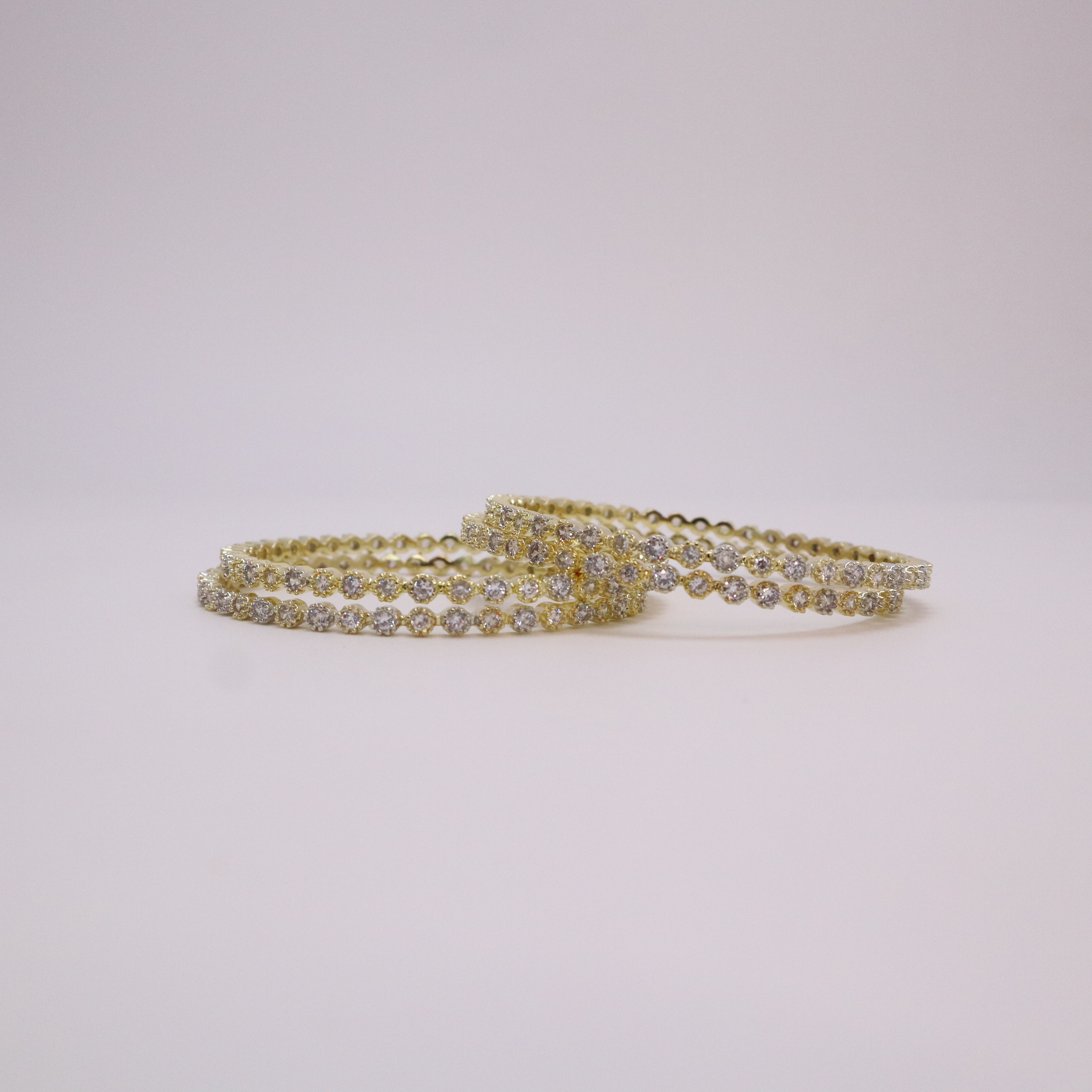 Keerthii Kalaa Sparkling AD Stone Bangle Set of 4 for Women & Girls - Premium Gold Bangles for Occasion Wear