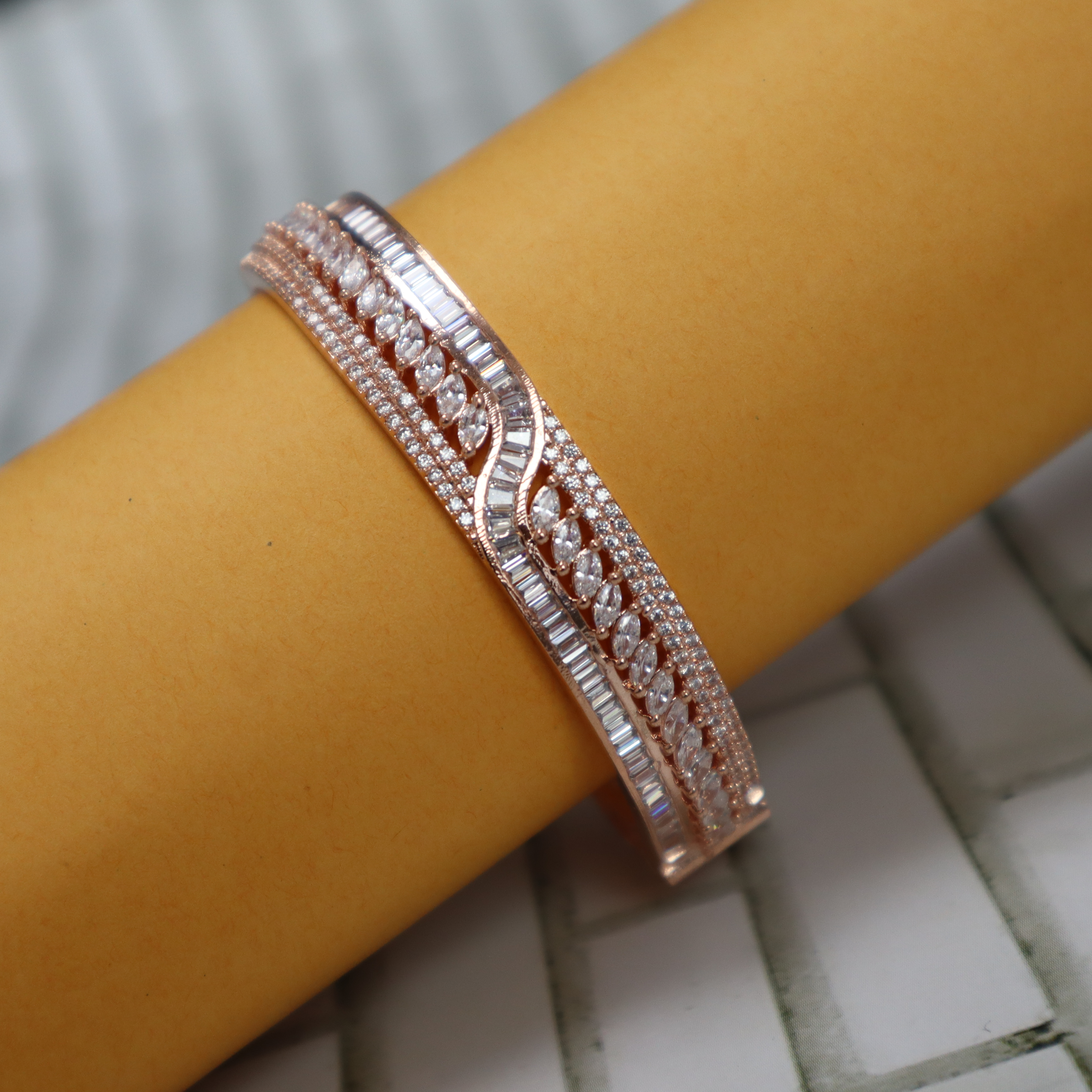 Keerthii Kalaa Marquise & Baguette AD Stone Bracelet for Women & Girls - Sparkling Rose Gold Bangle, Side Open, Free Size