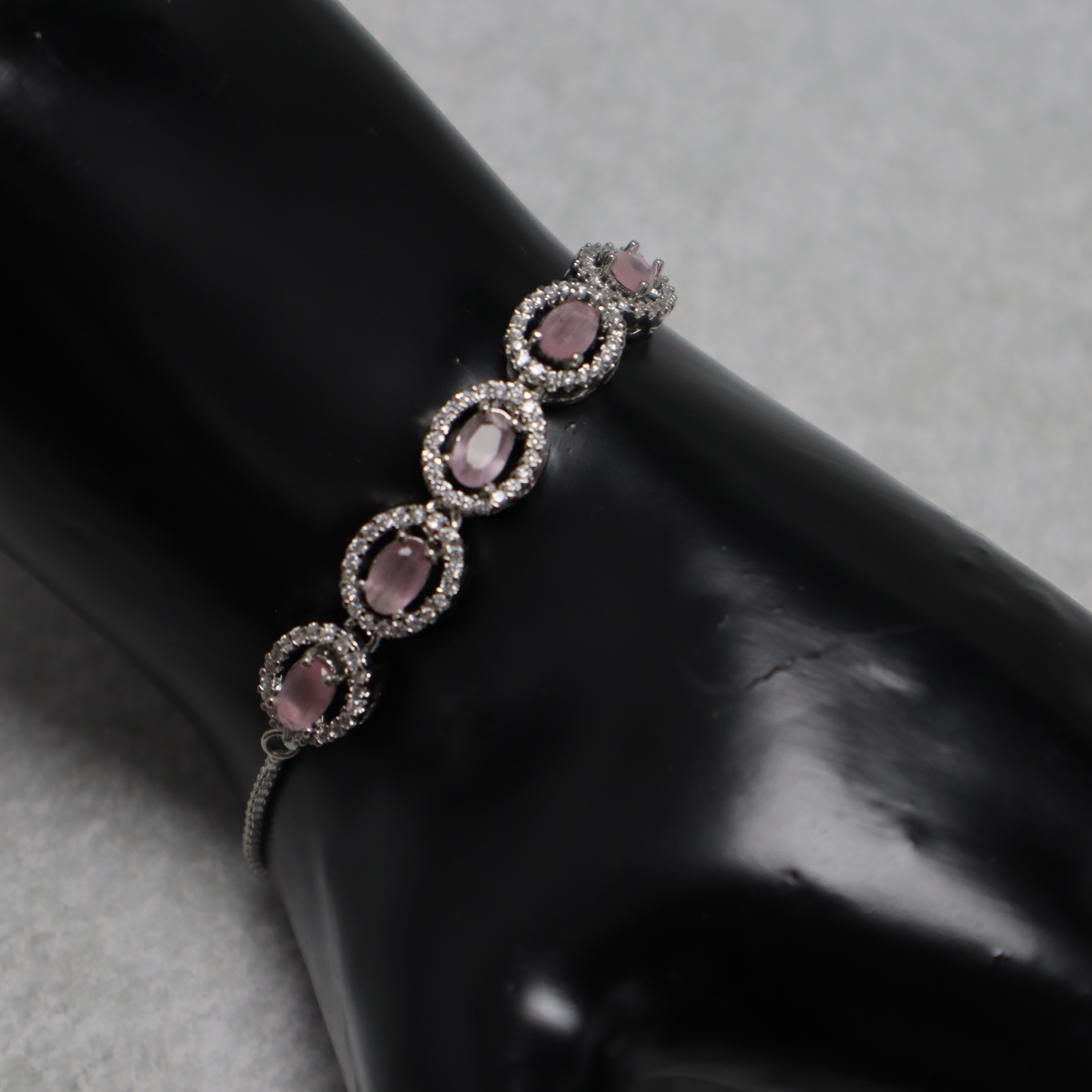 Keerthii Kalaa Pastel Pink Oval AD Stone Bracelet for Women & Girls - Sparkling Silver Chain Bracelet, Adjustable