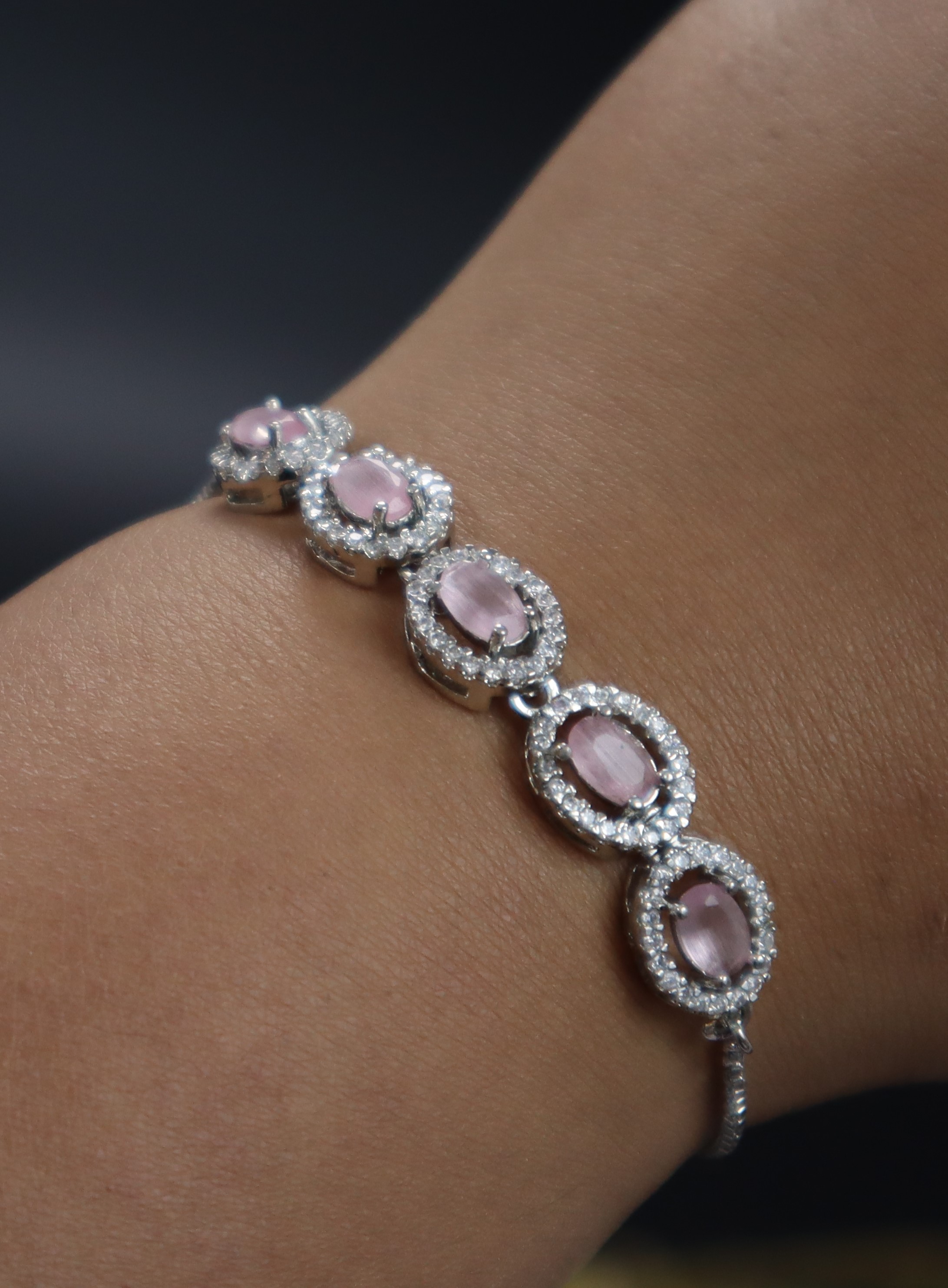 Keerthii Kalaa Pastel Pink Oval AD Stone Bracelet for Women & Girls - Sparkling Silver Chain Bracelet, Adjustable