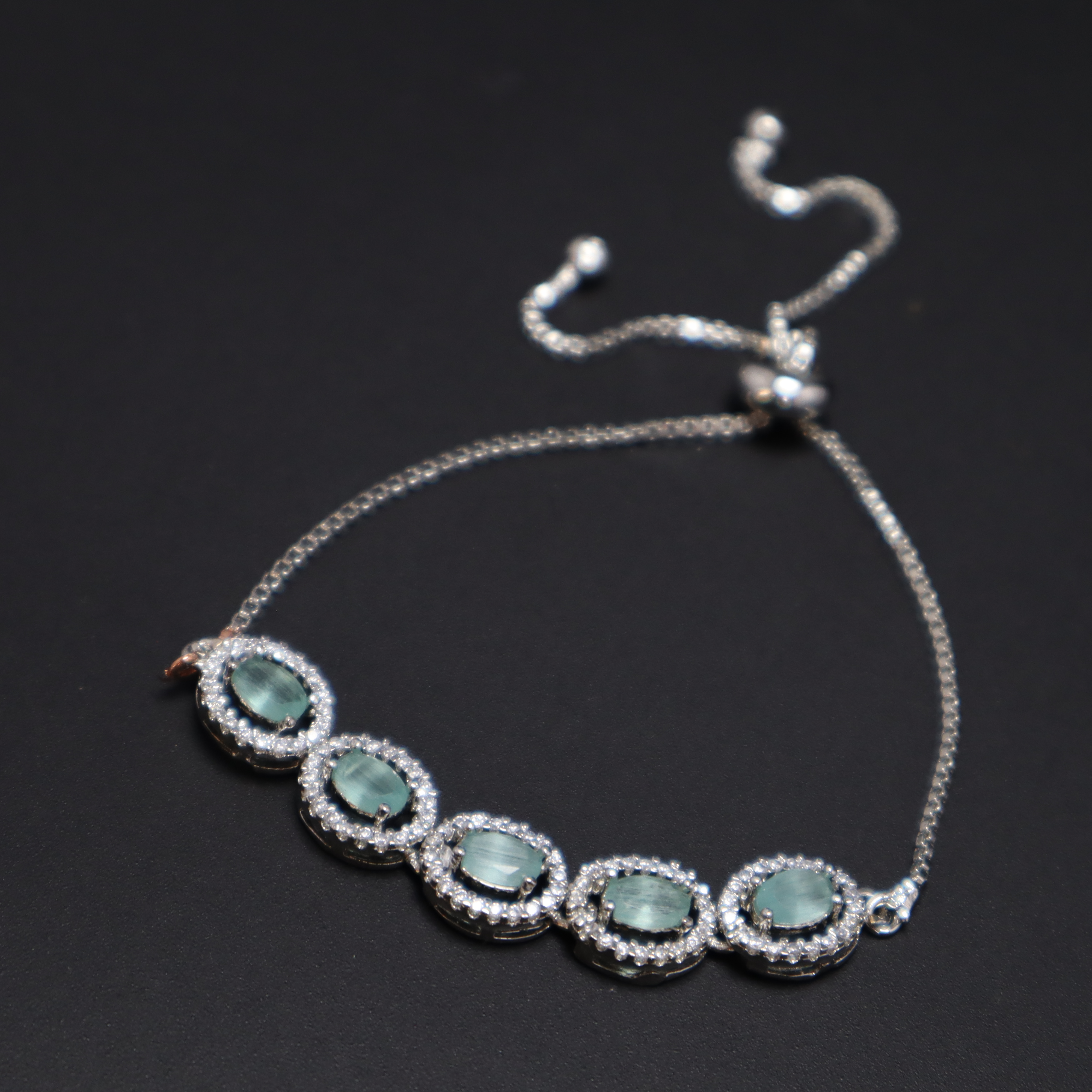 Keerthii Kalaa Mint Green Oval AD Stone Bracelet for Women & Girls - Sparkling Silver Chain Bracelet, Adjustable