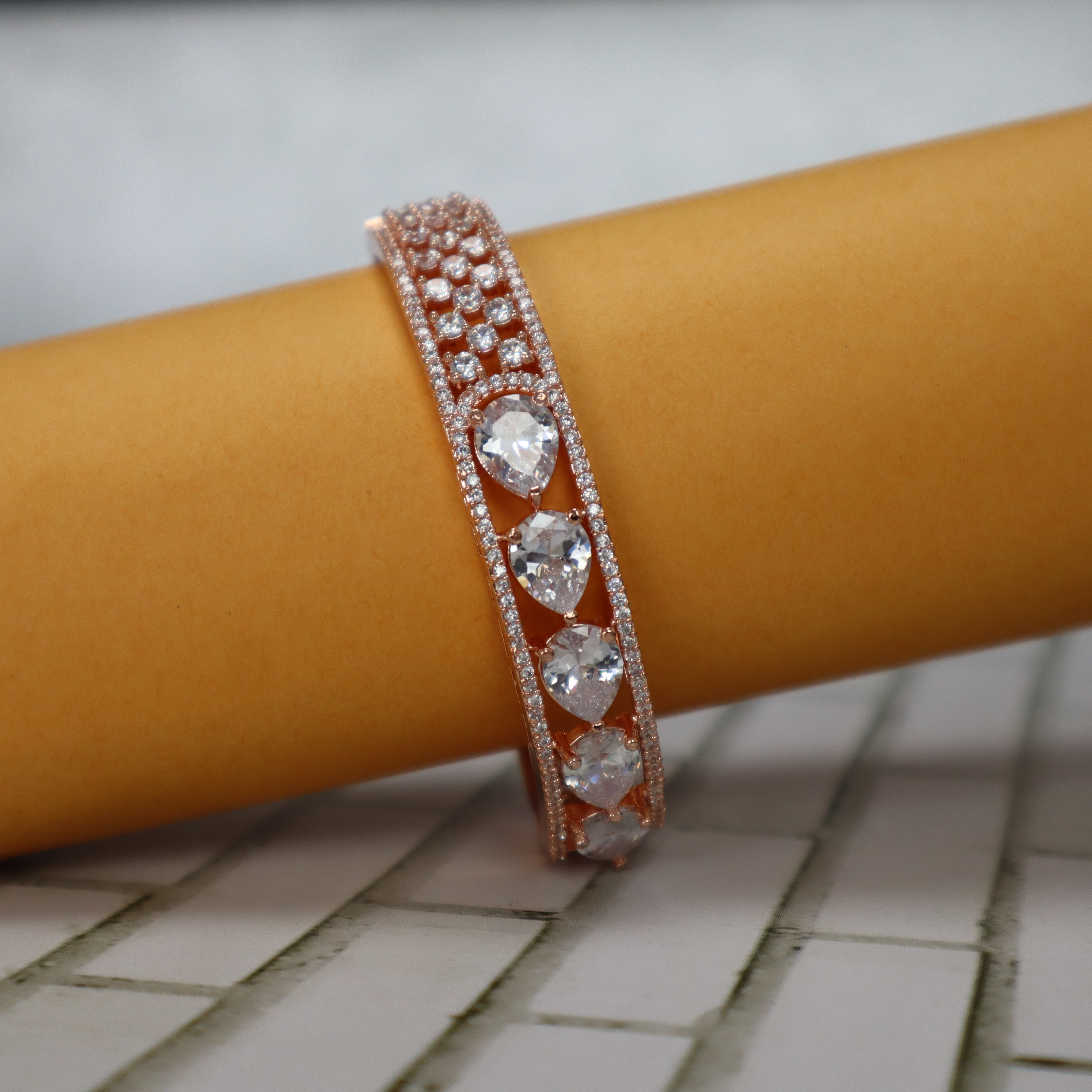 Keerthii Kalaa Pear Cut AD Stone Bracelet for Women & Girls - Sparkling Rose Gold Bangle, Side Open, Free Size