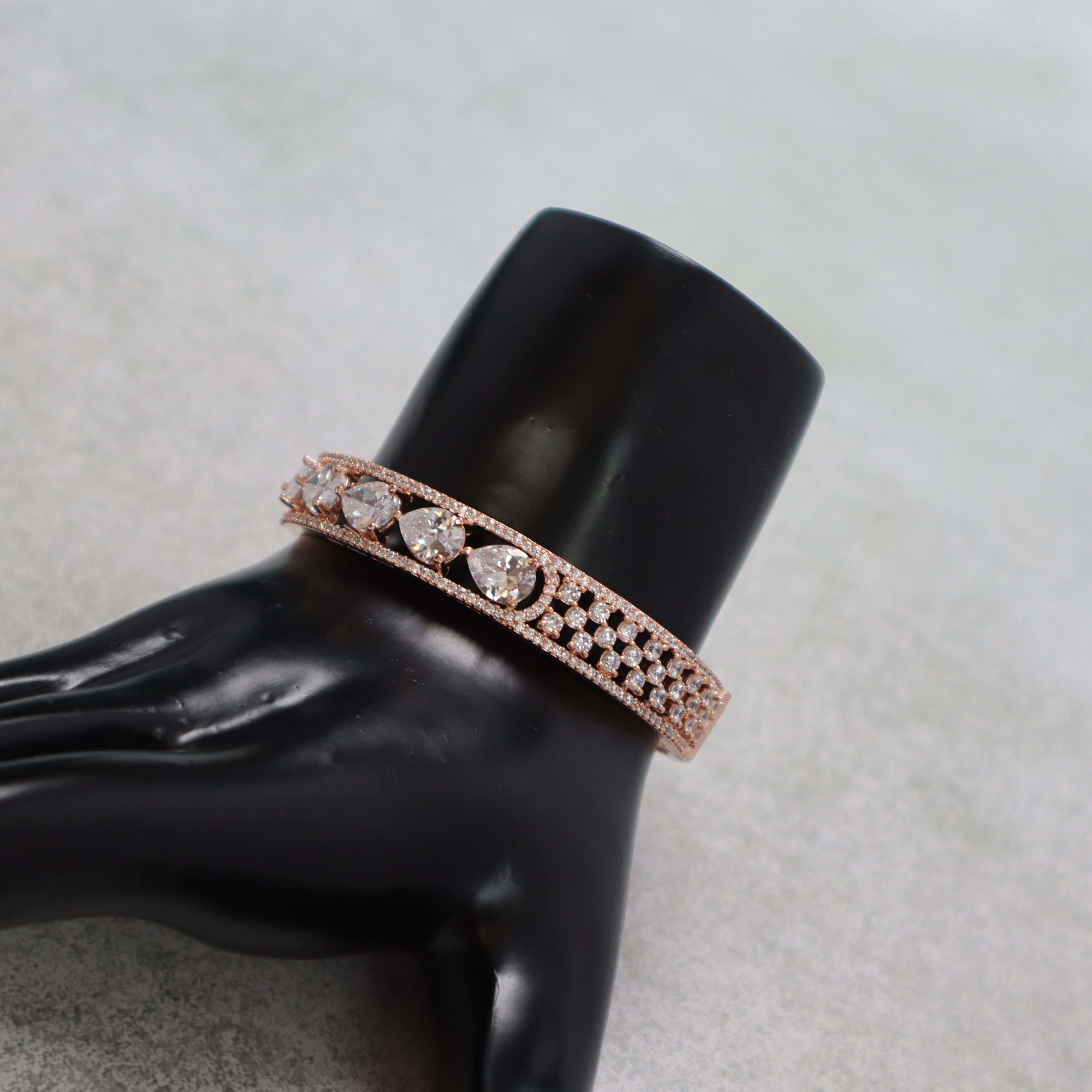 Keerthii Kalaa Pear Cut AD Stone Bracelet for Women & Girls - Sparkling Rose Gold Bangle, Side Open, Free Size