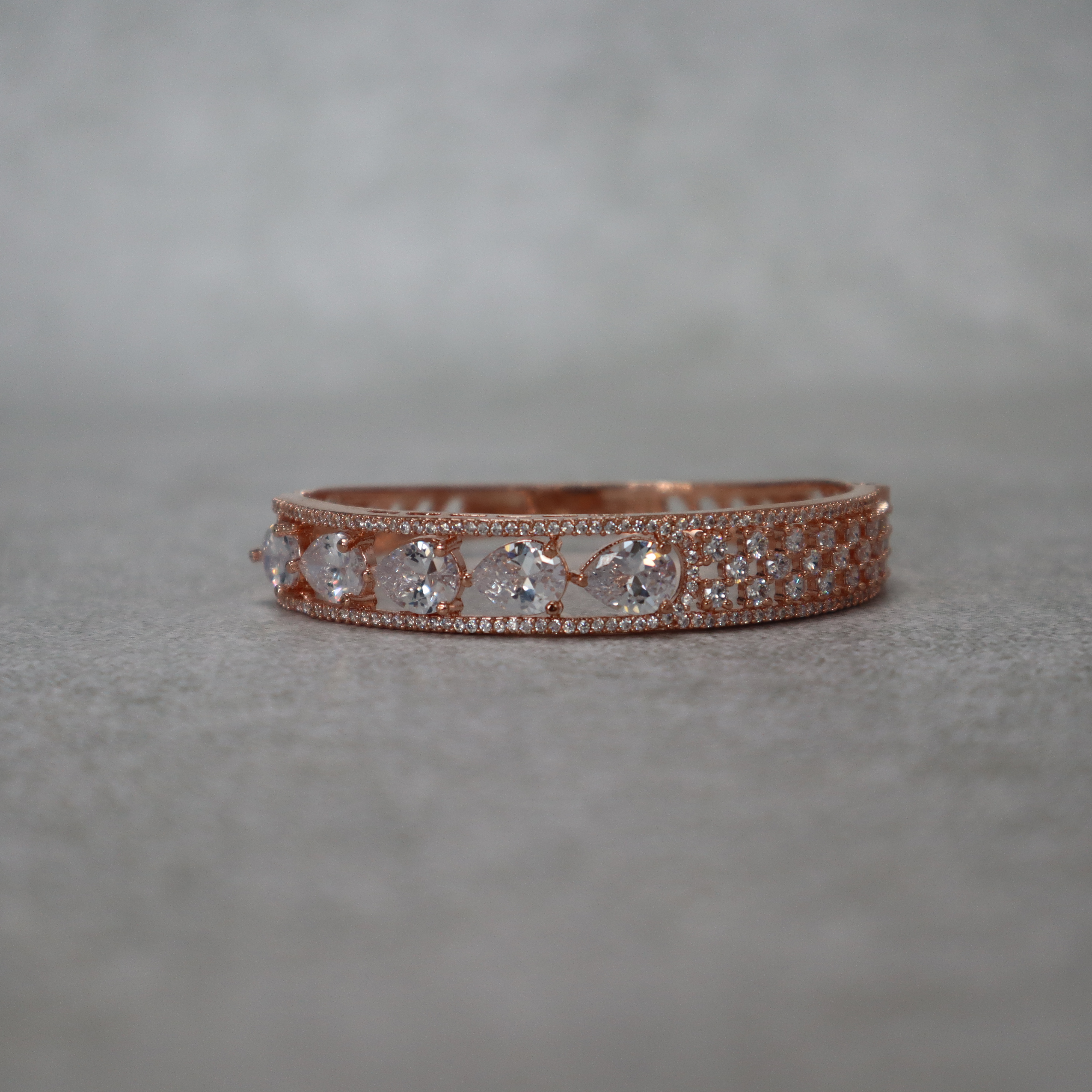 Keerthii Kalaa Pear Cut AD Stone Bracelet for Women & Girls - Sparkling Rose Gold Bangle, Side Open, Free Size