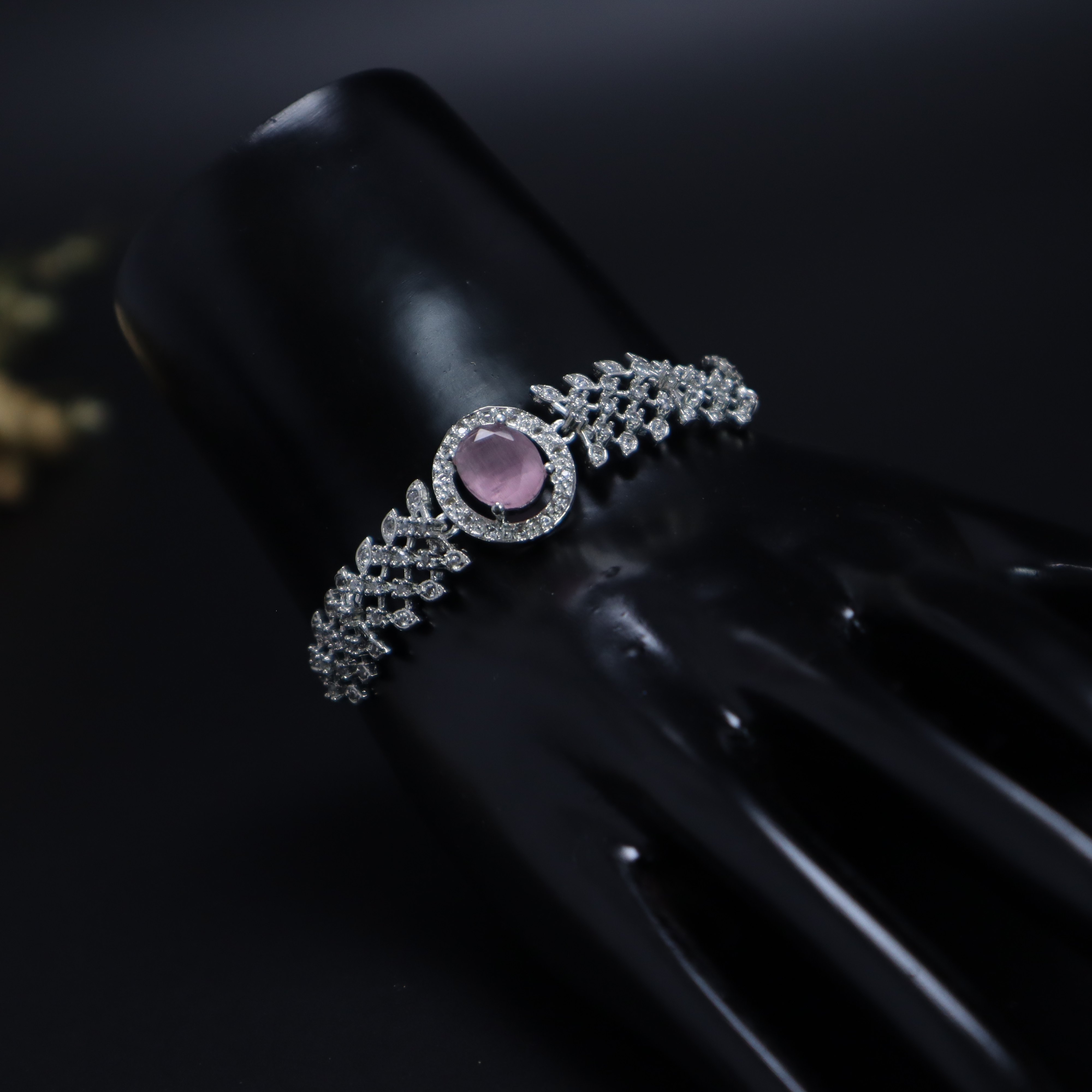 Keerthii Kalaa Pastel Pink Center Stone AD Bracelet for Women & Girls - Sparkling Silver Adjustable Chain