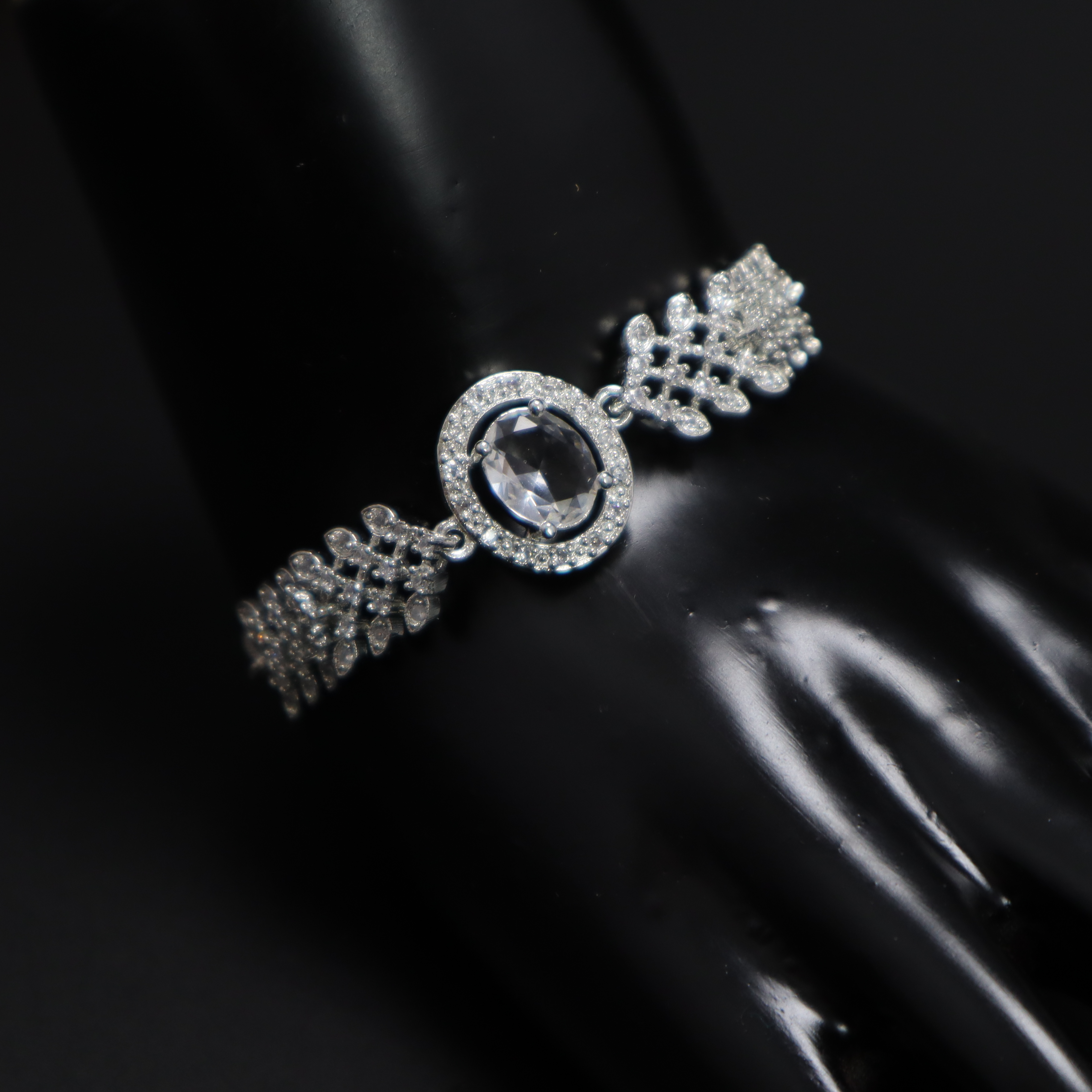 Keerthii Kalaa Oval Center Stone AD Bracelet for Women & Girls - Sparkling Silver Adjustable Chain