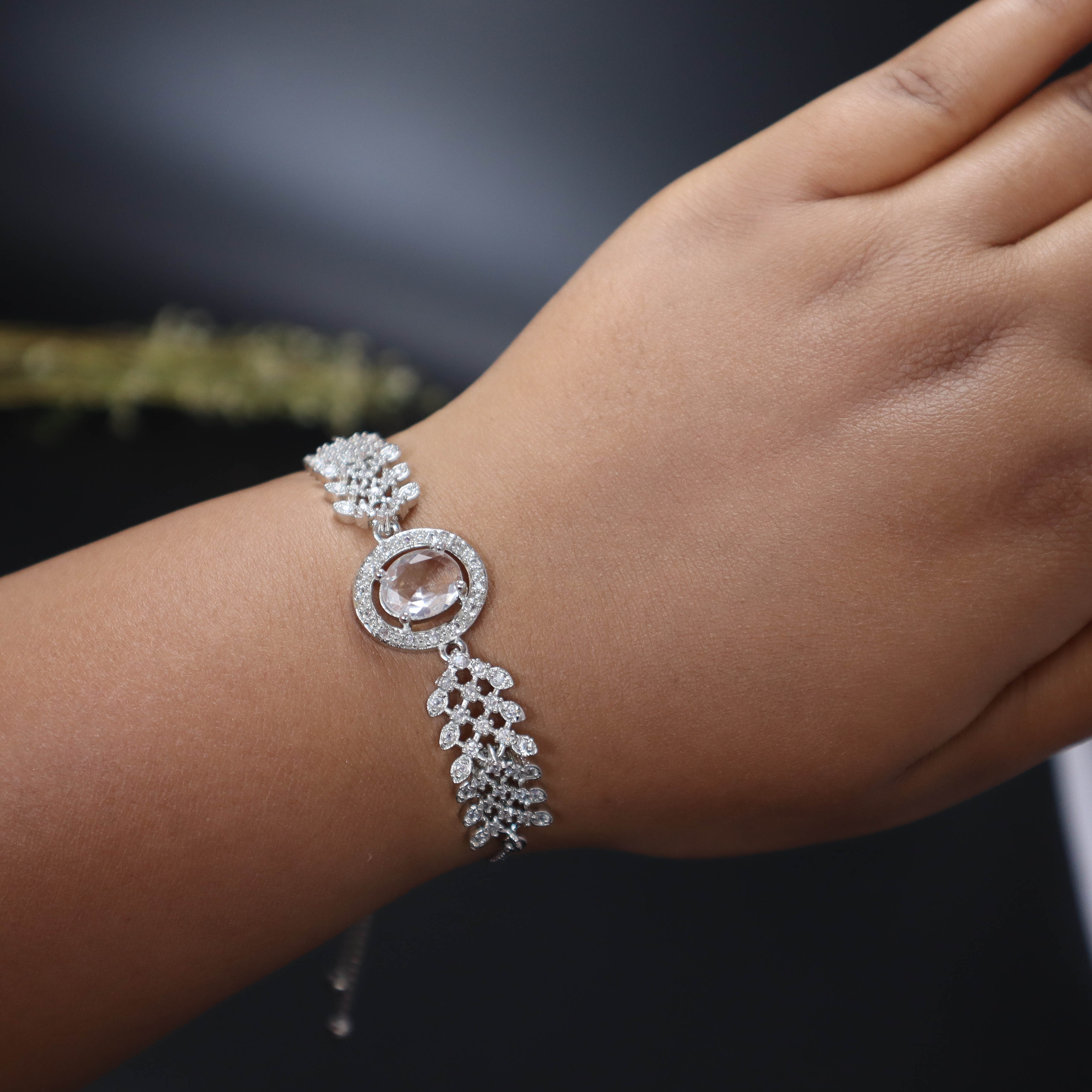Keerthii Kalaa Oval Center Stone AD Bracelet for Women & Girls - Sparkling Silver Adjustable Chain
