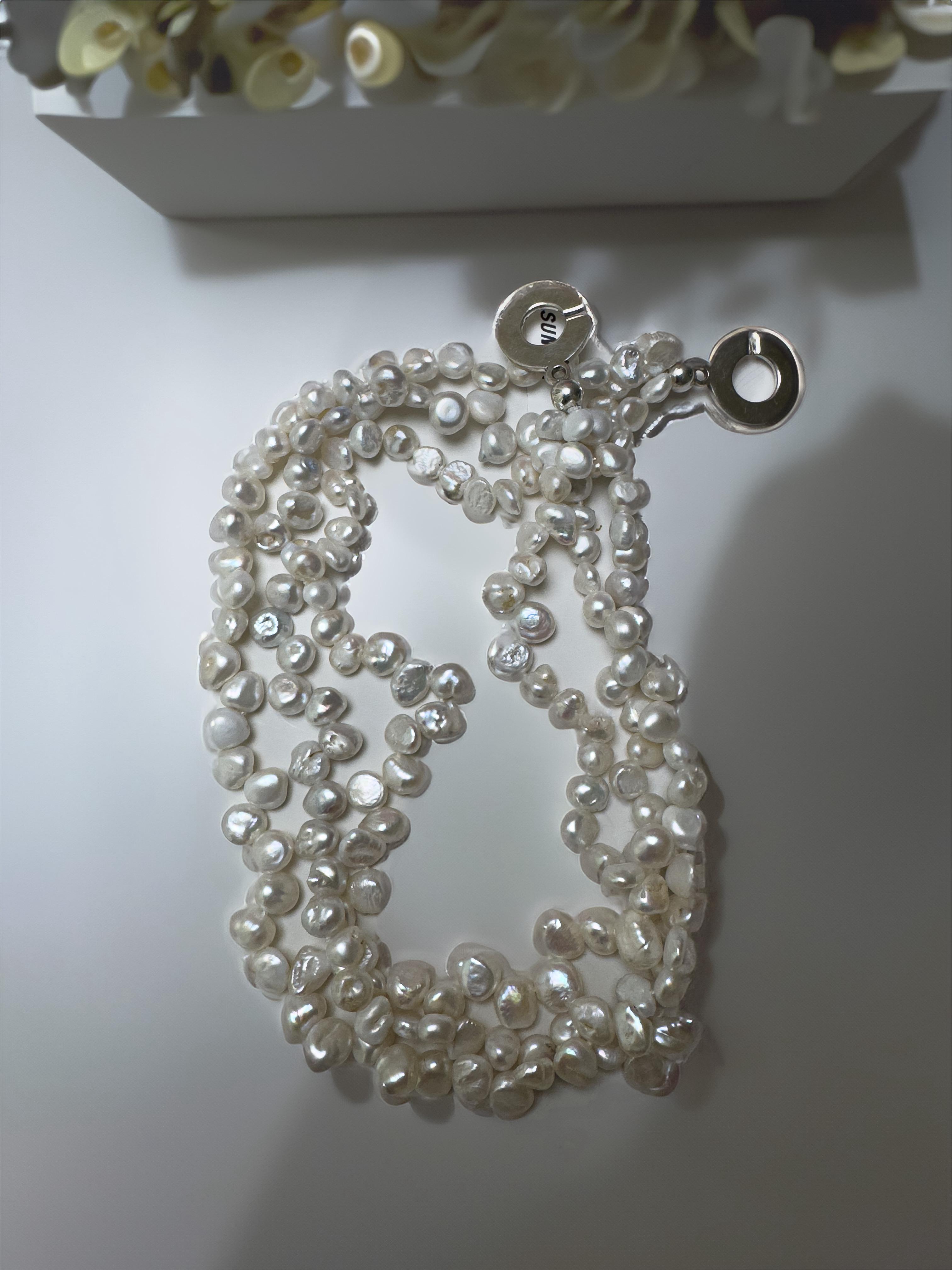 Collar entrelazado de perlas 