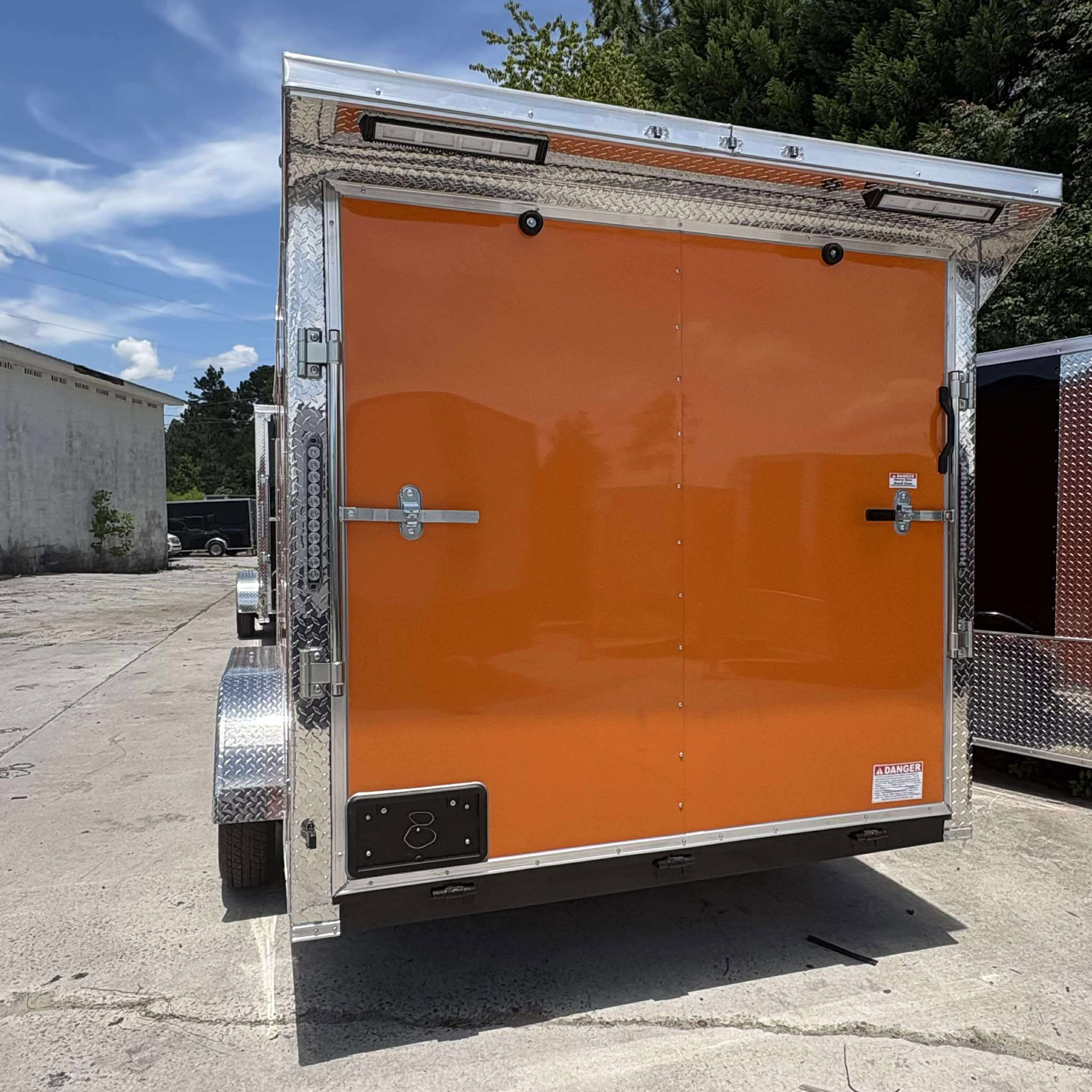 7X14TA Enclosed Cargo Trailer With Loading Lights Orange Quality Cargo 