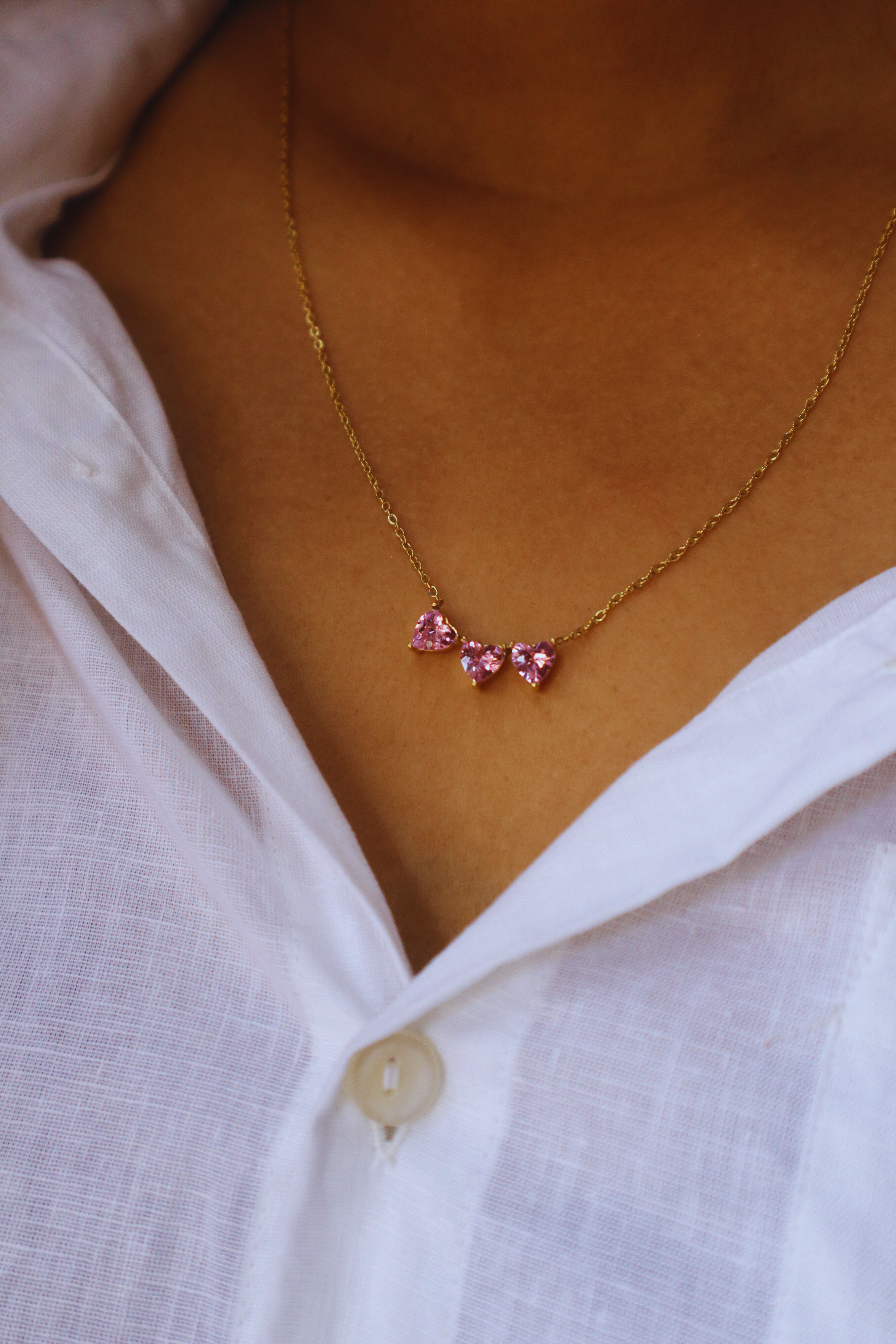 Gold Necklace with Pink Heart Pendants