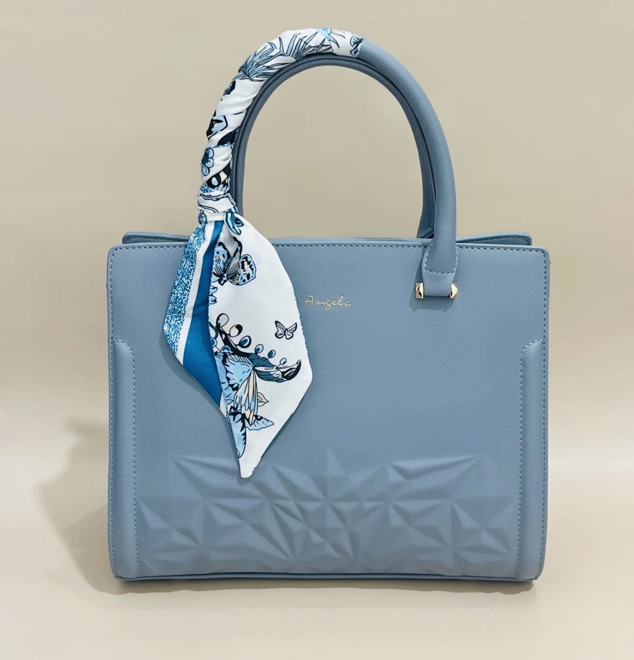 Sac à main élégant en cuir beige