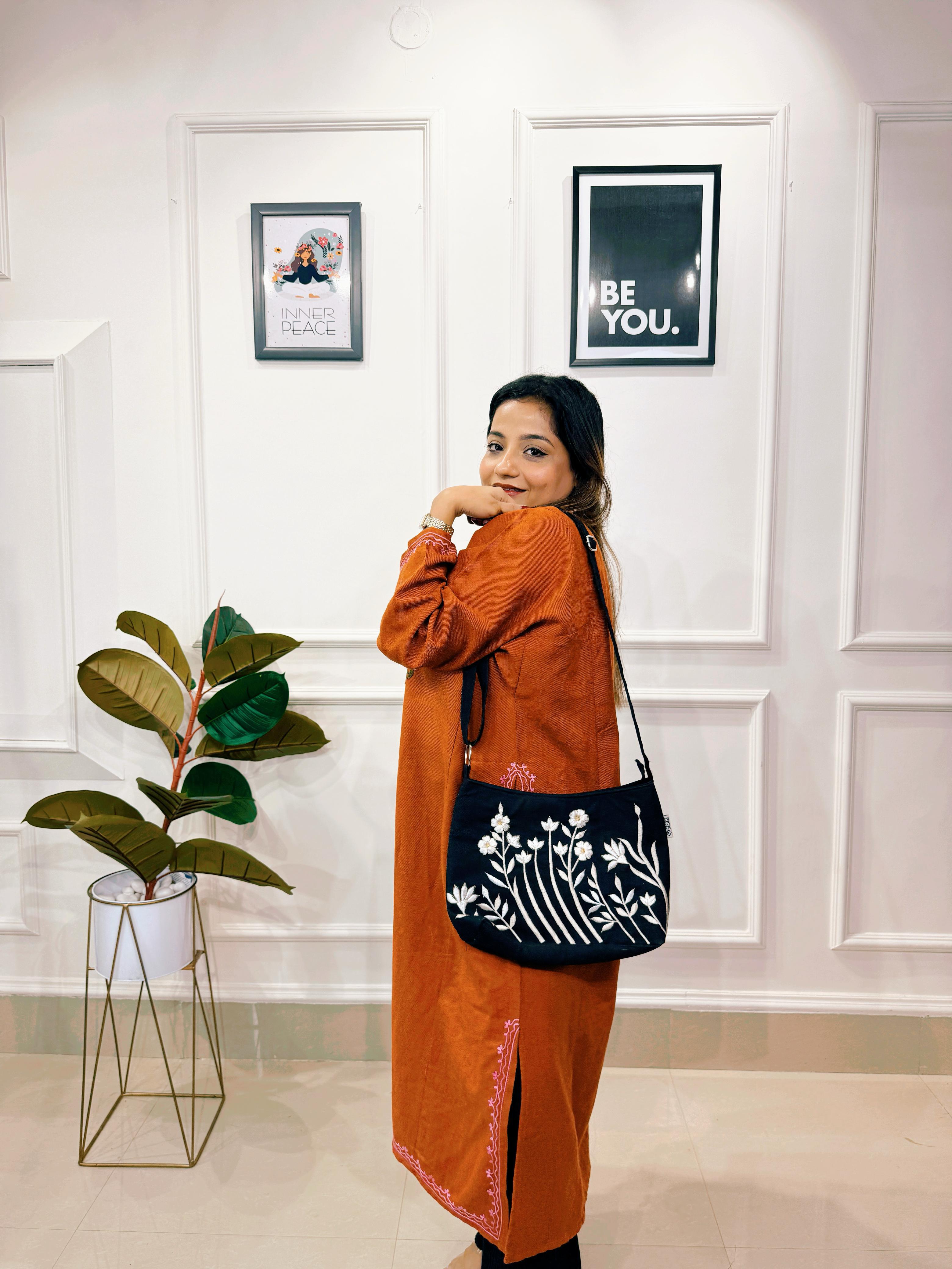 BLACK FLORAL EMBROIDERED CANVAS SLING BAG