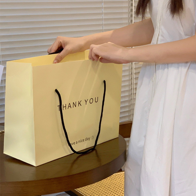Túi giấy tại chỗ THANKYOU túi mua sắm cao cấp ins cửa hàng quần áo trẻ em quần áo quà tặng túi đóng gói quà tặng