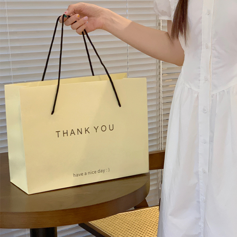 Túi giấy tại chỗ THANKYOU túi mua sắm cao cấp ins cửa hàng quần áo trẻ em quần áo quà tặng túi đóng gói quà tặng