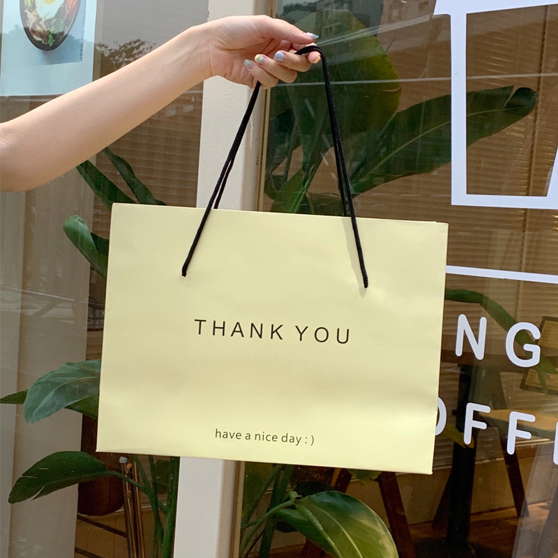 Túi giấy tại chỗ THANKYOU túi mua sắm cao cấp ins cửa hàng quần áo trẻ em quần áo quà tặng túi đóng gói quà tặng