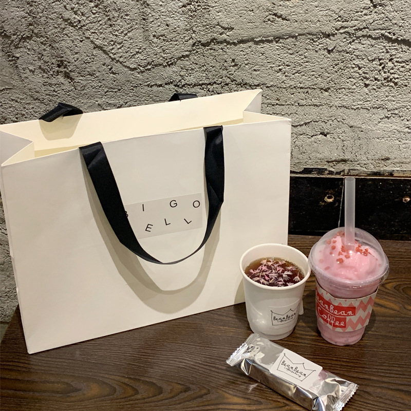 Combo 10 Túi Giấy Kraft In Logo – Giải Pháp Bao Bì Sang Trọng Cho Cửa Hàng Quần Áo Trẻ Em & Thời Trang Nữ
