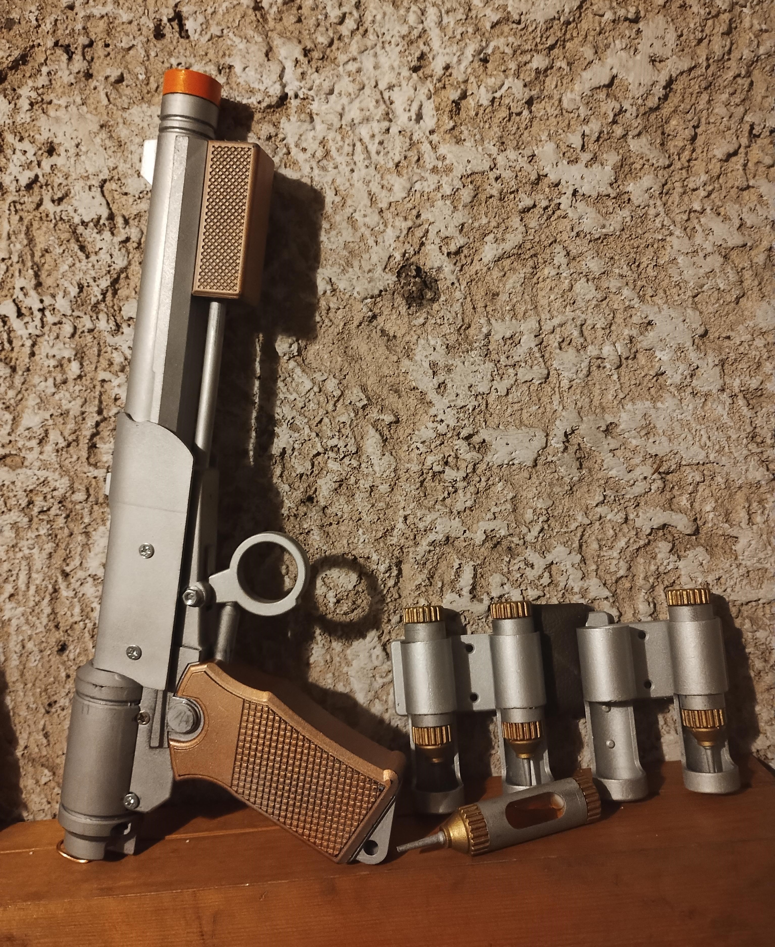 Lucy's  needler pistol.