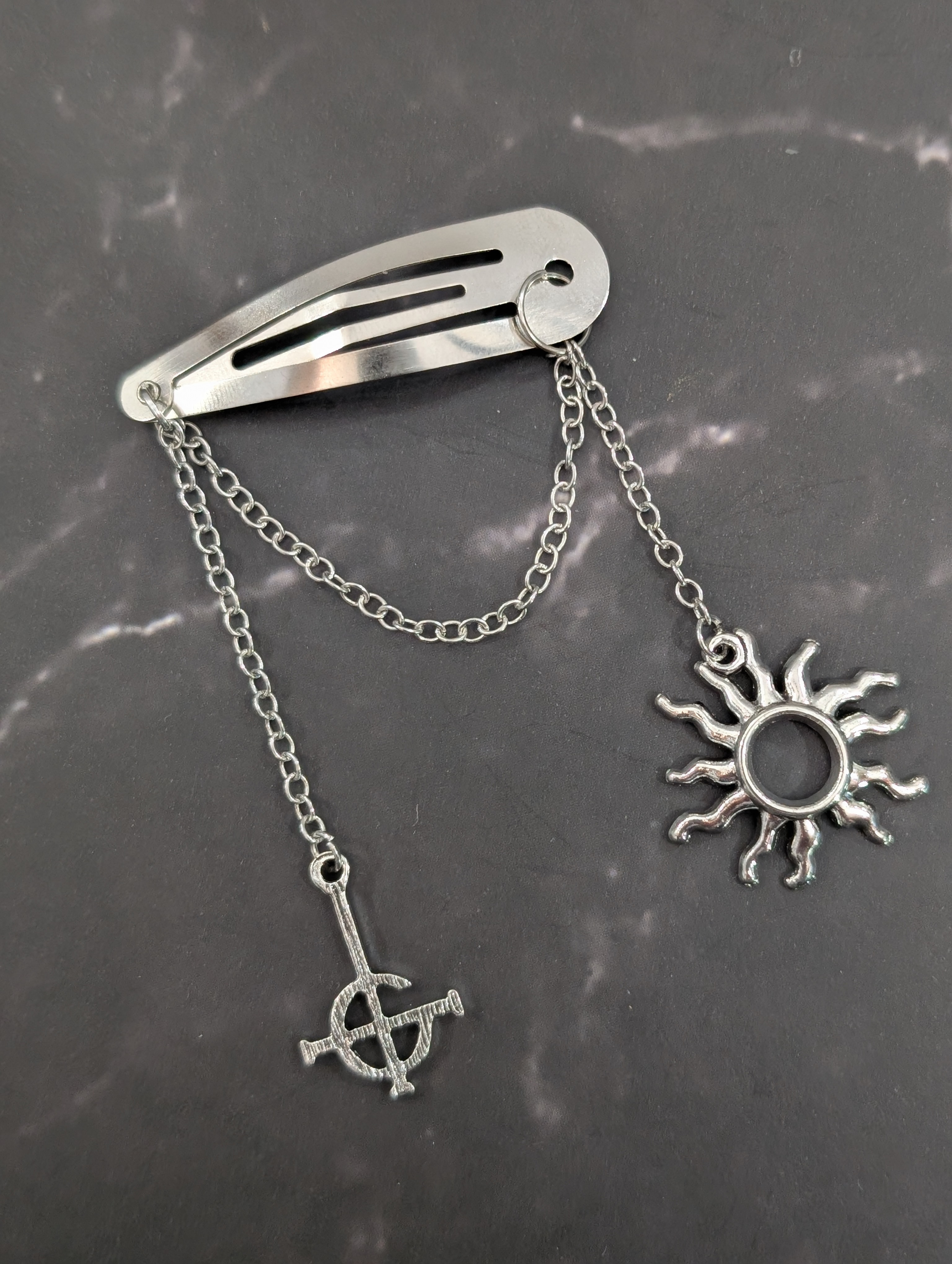 Silver Hair Clip with Grucifix and Sun Charms