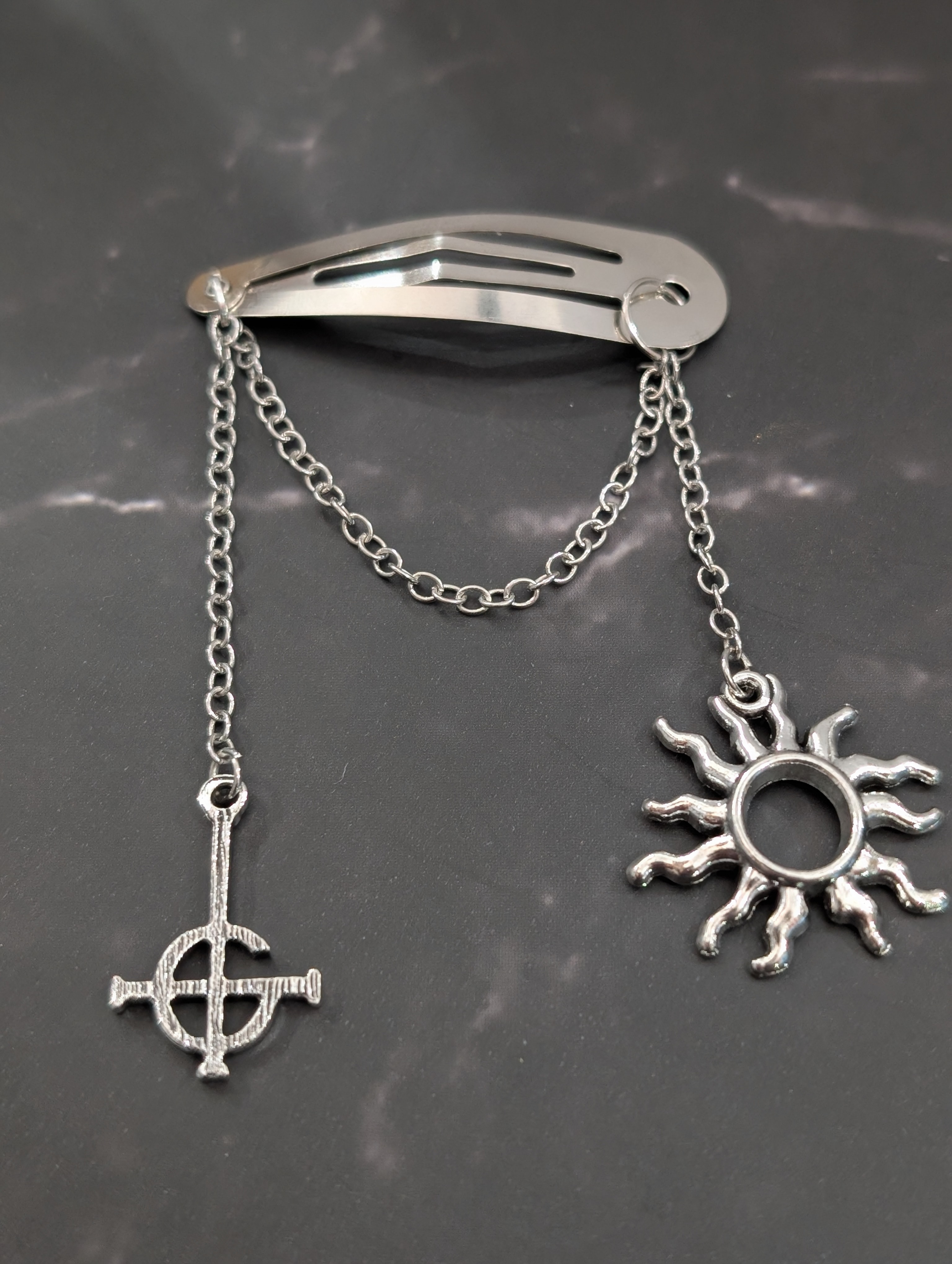 Silver Hair Clip with Grucifix and Sun Charms