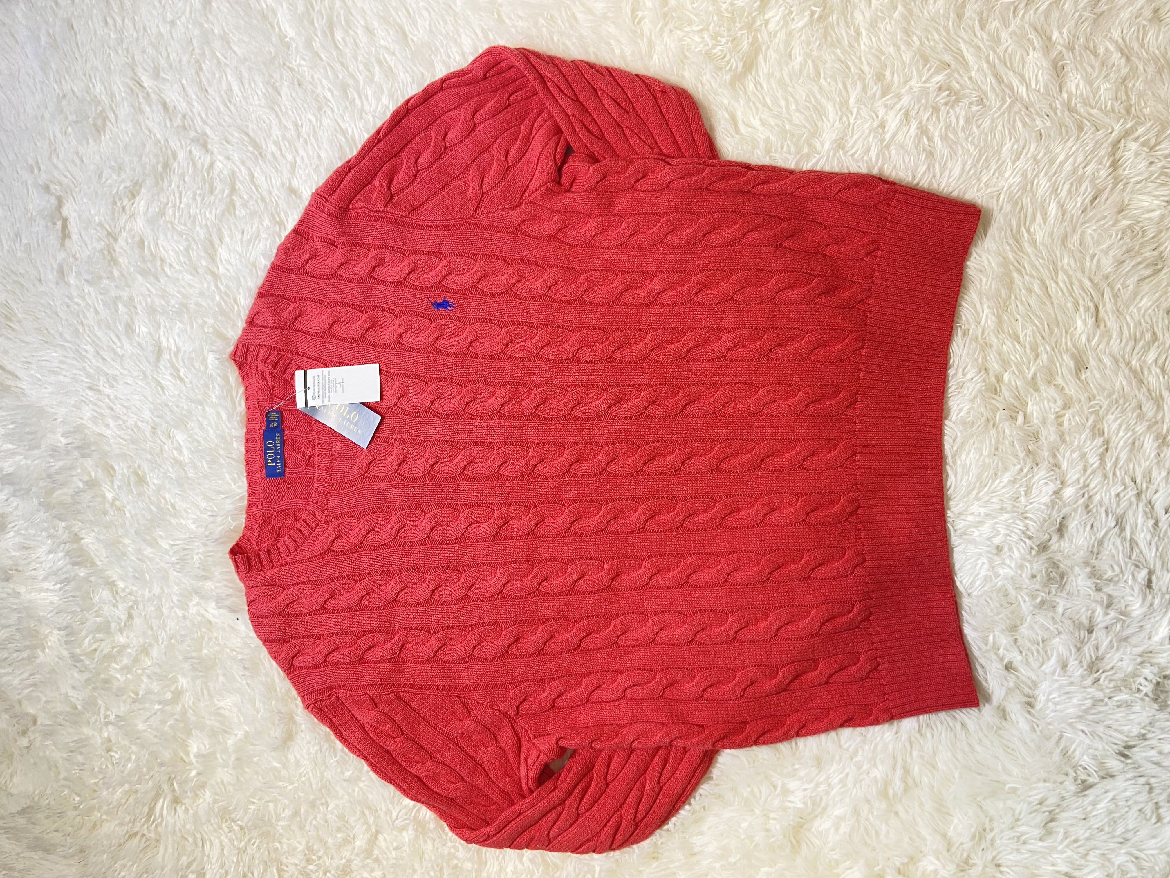 Pull torsadé Ralph Lauren corail 