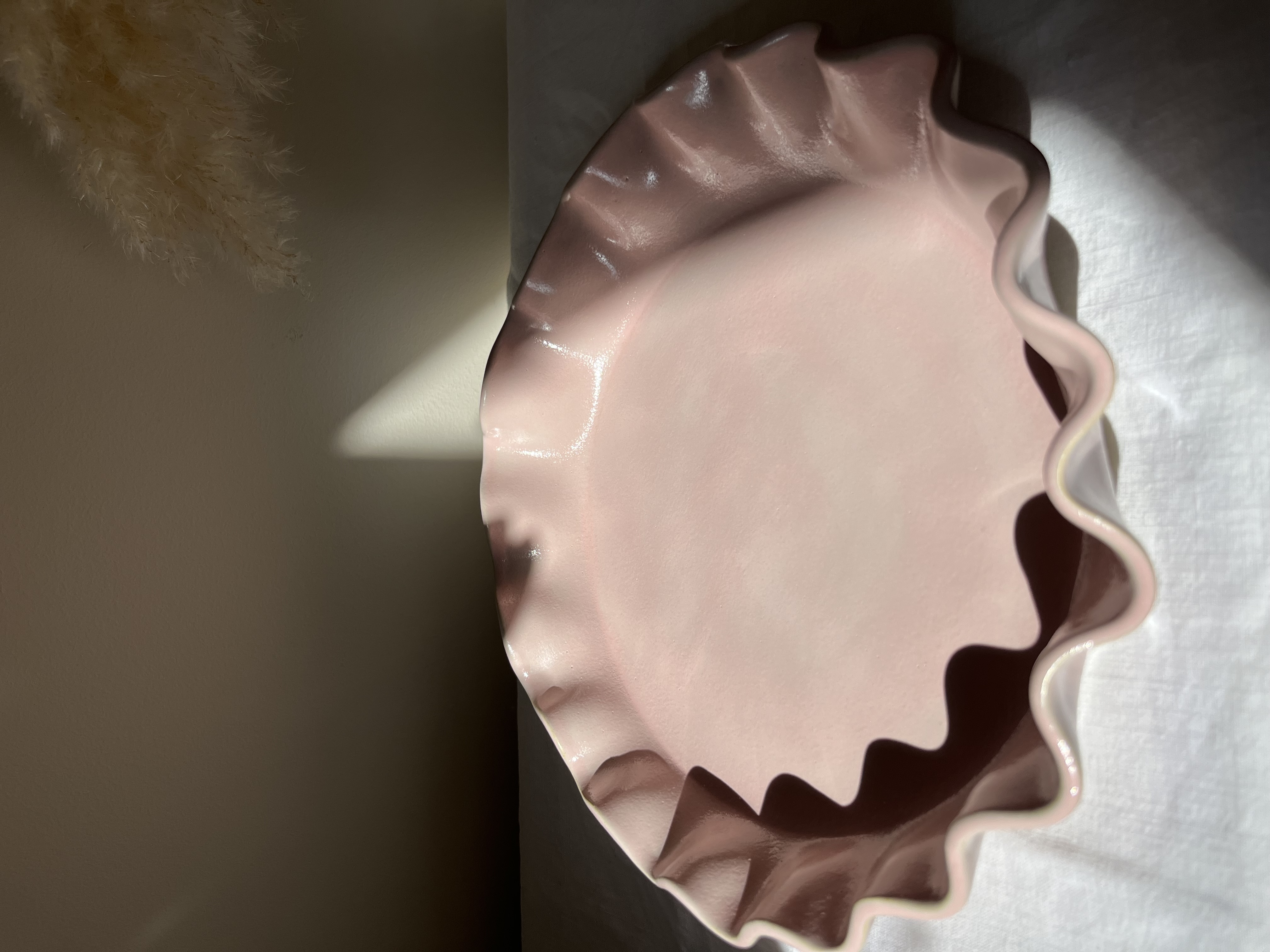 Plat à vagues grès rose