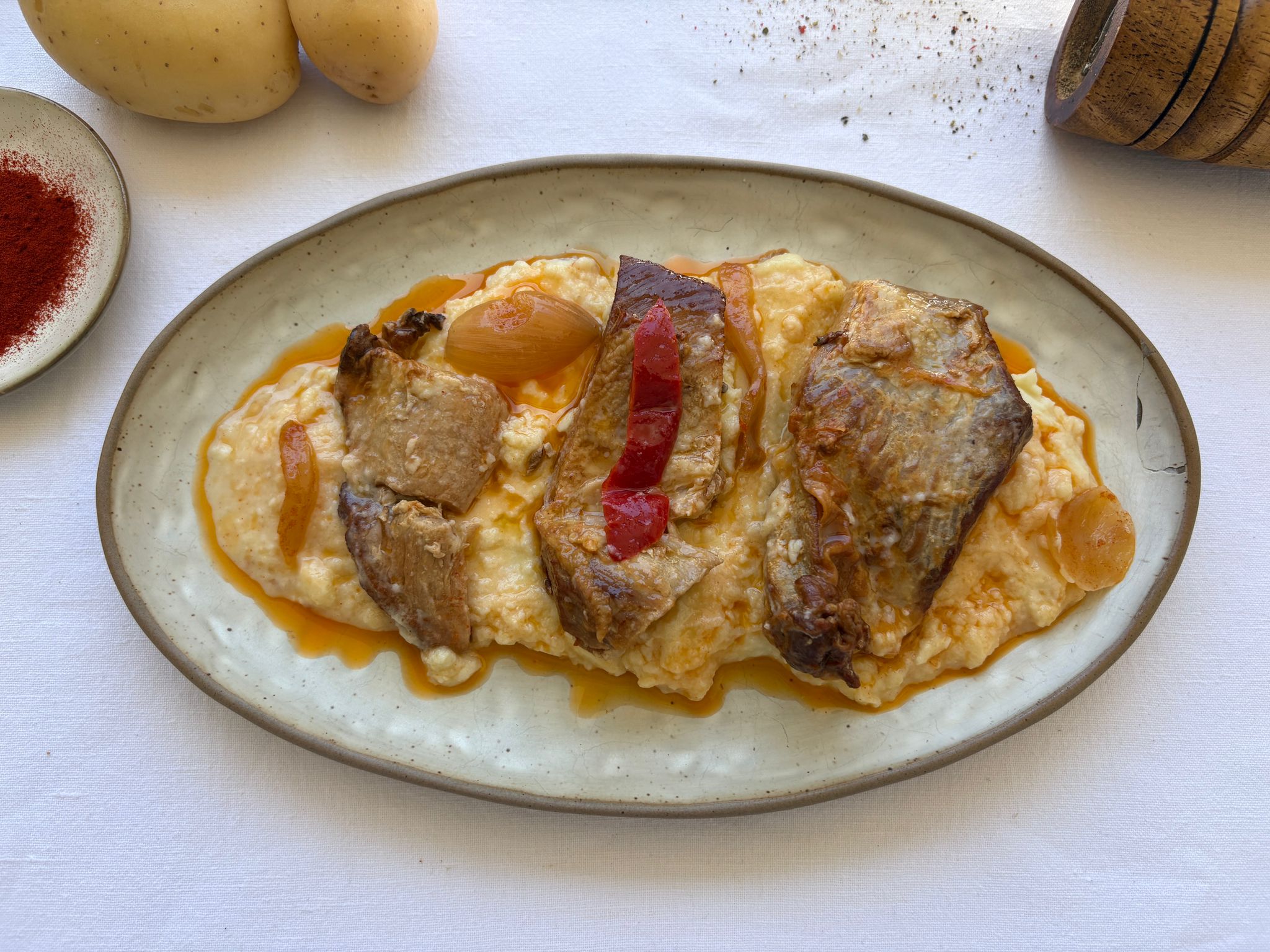 Secreto con puré de patatas