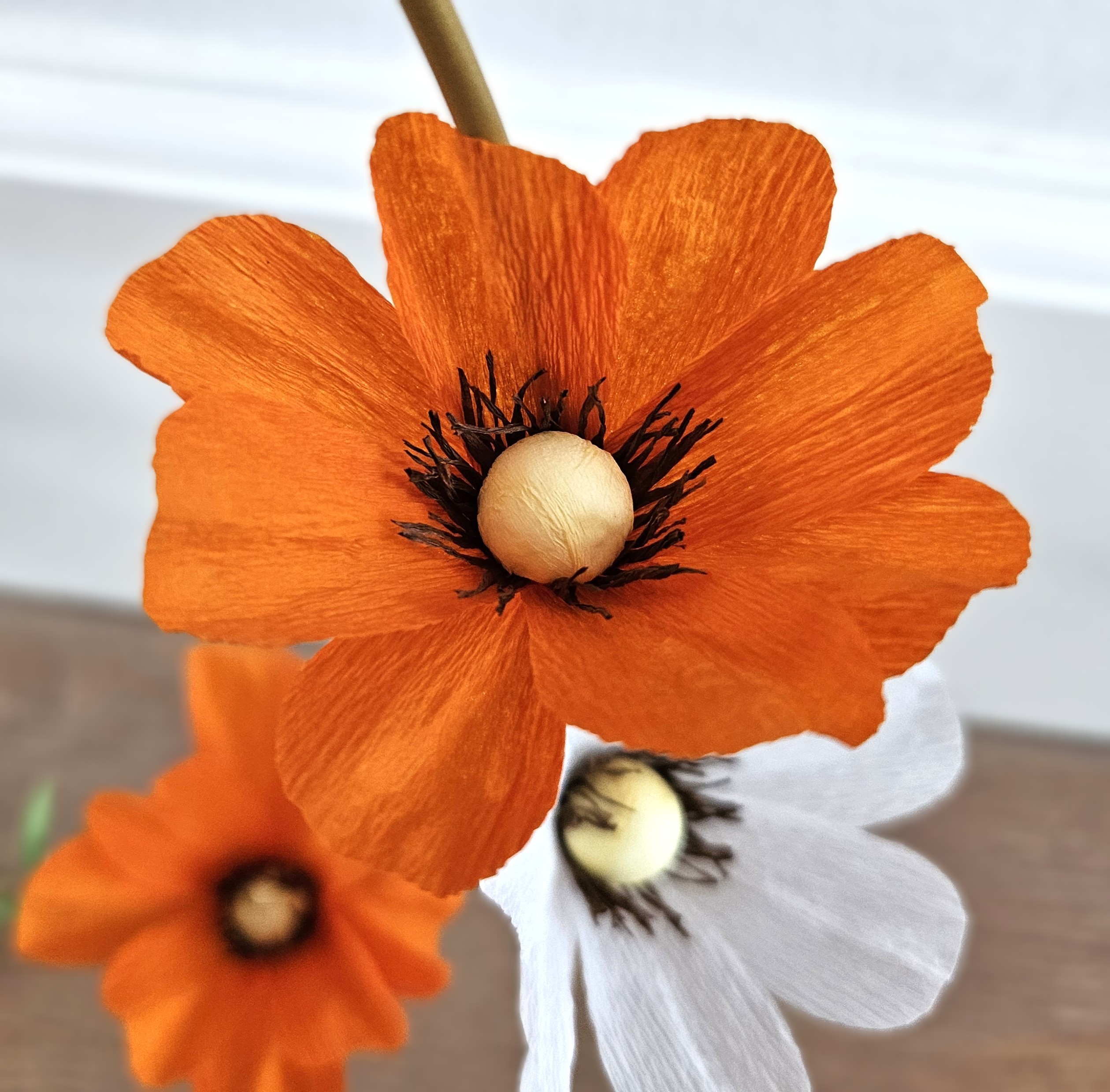 Bloemenkrans oranje wit