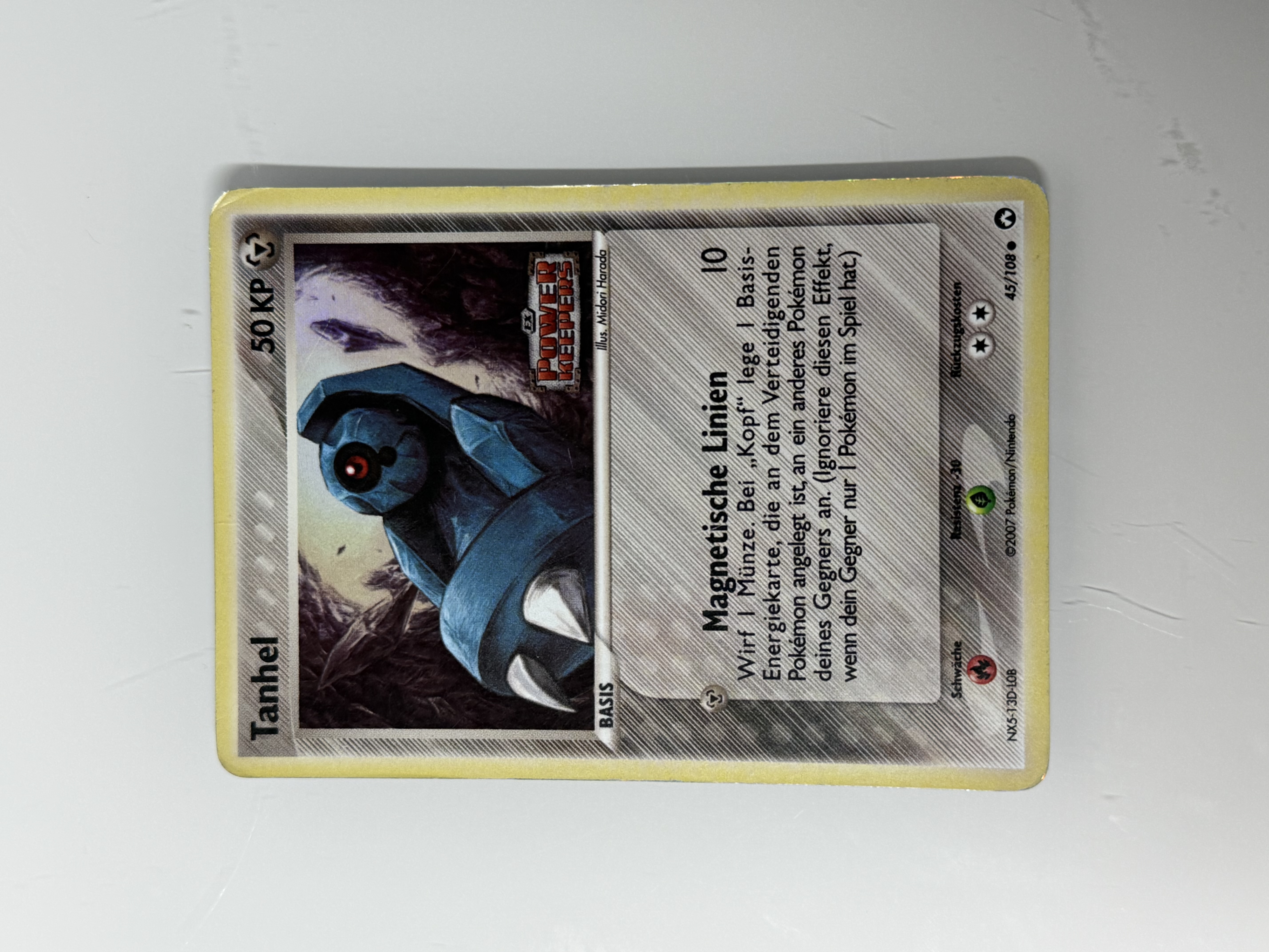 Tanhel 45/108 holo stamp