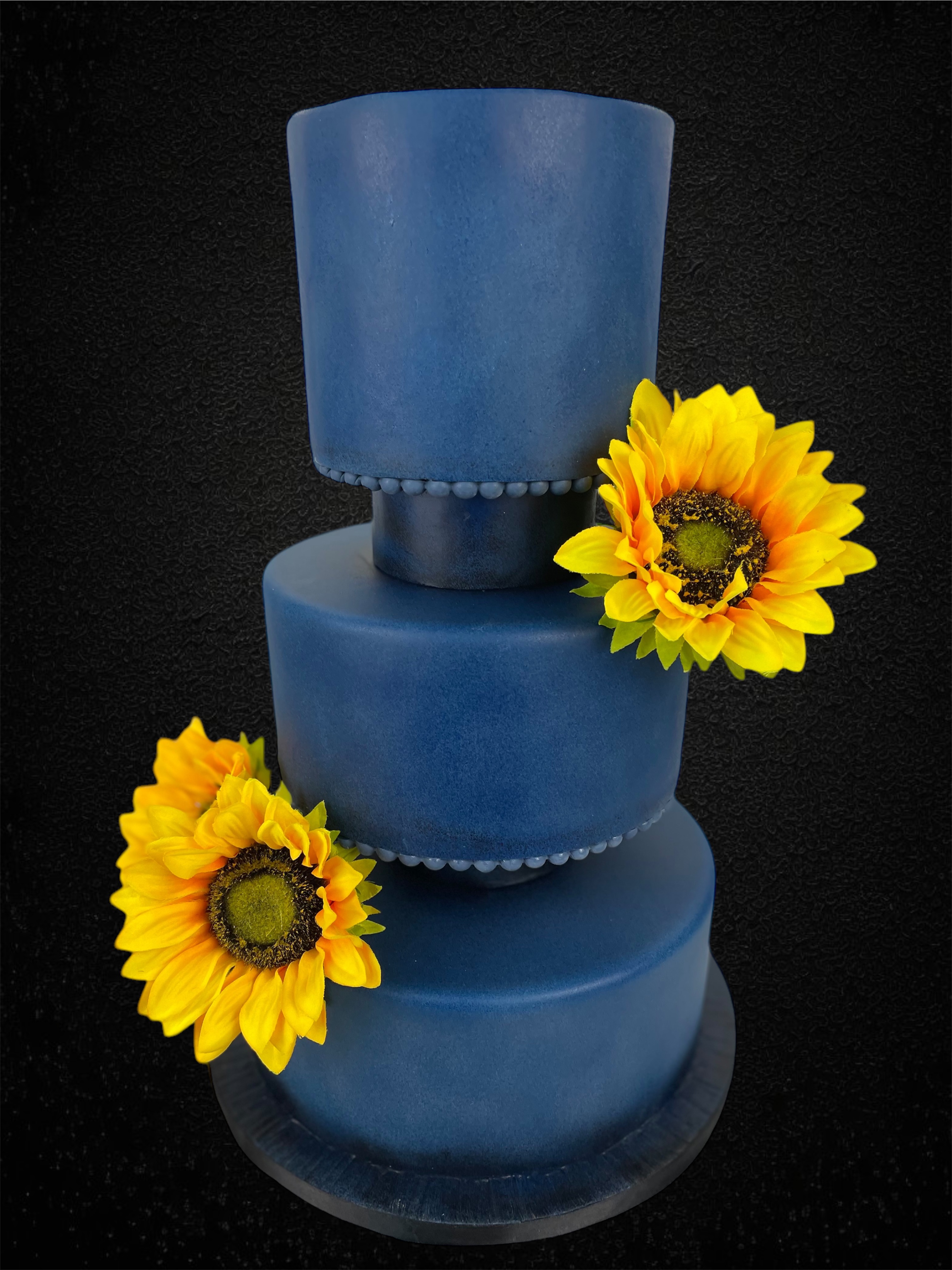 Elegant Blue Three-Tier Wedding Cake