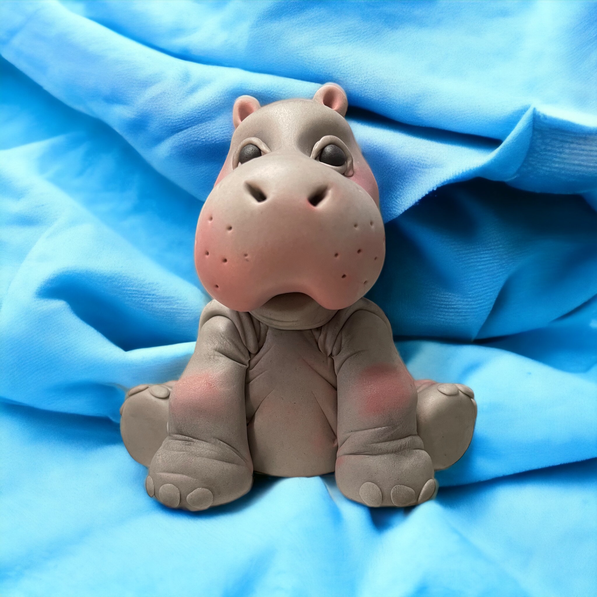 Adorable Hippo Figurine cake topper