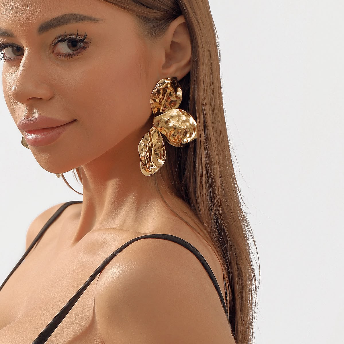 Aretes dorados flor grandes
