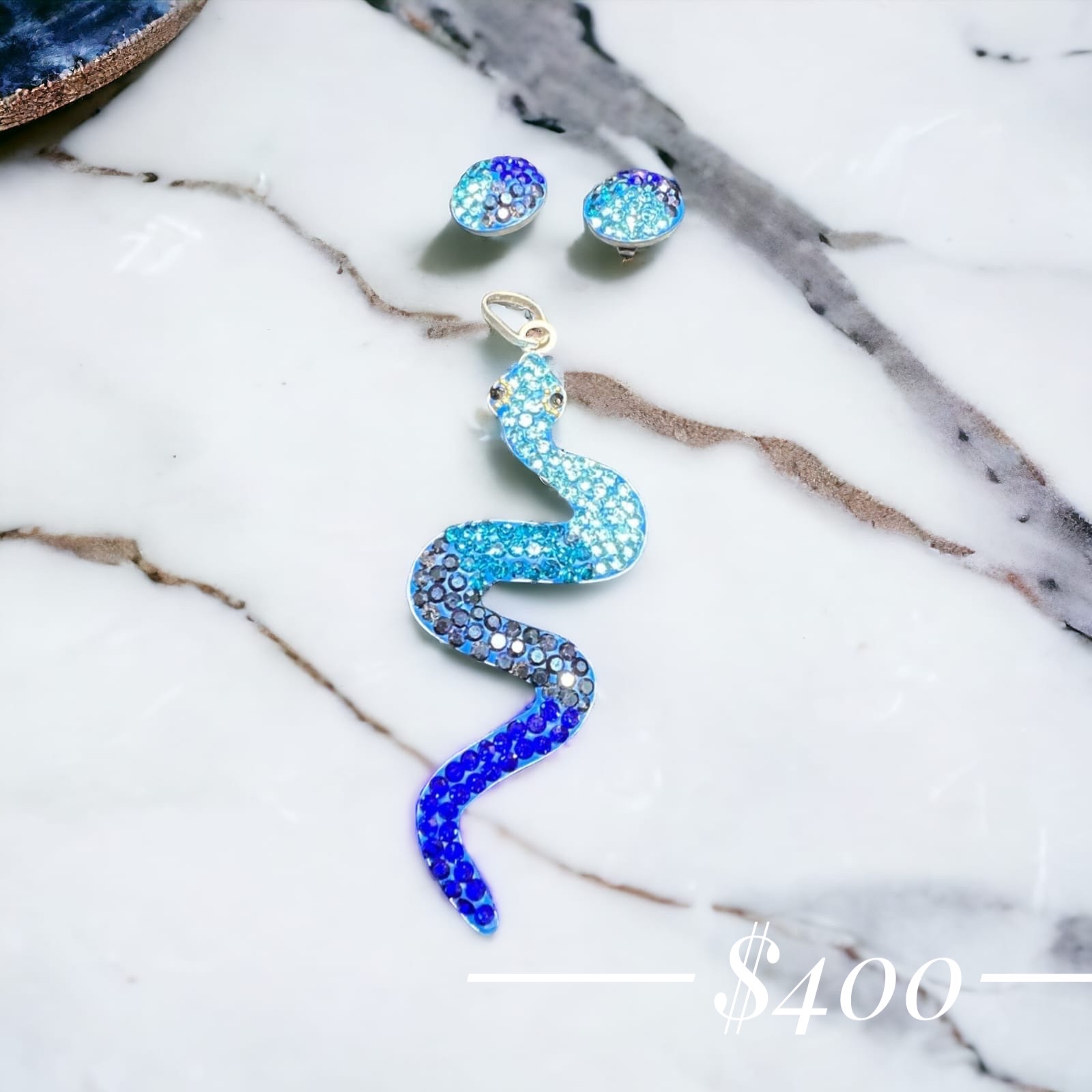 Dije y aretes Serpiente plata .925