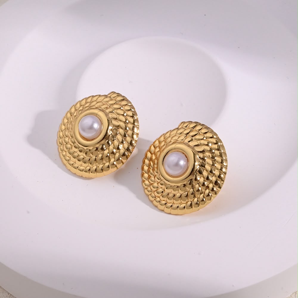 Aretes dorados con perla
