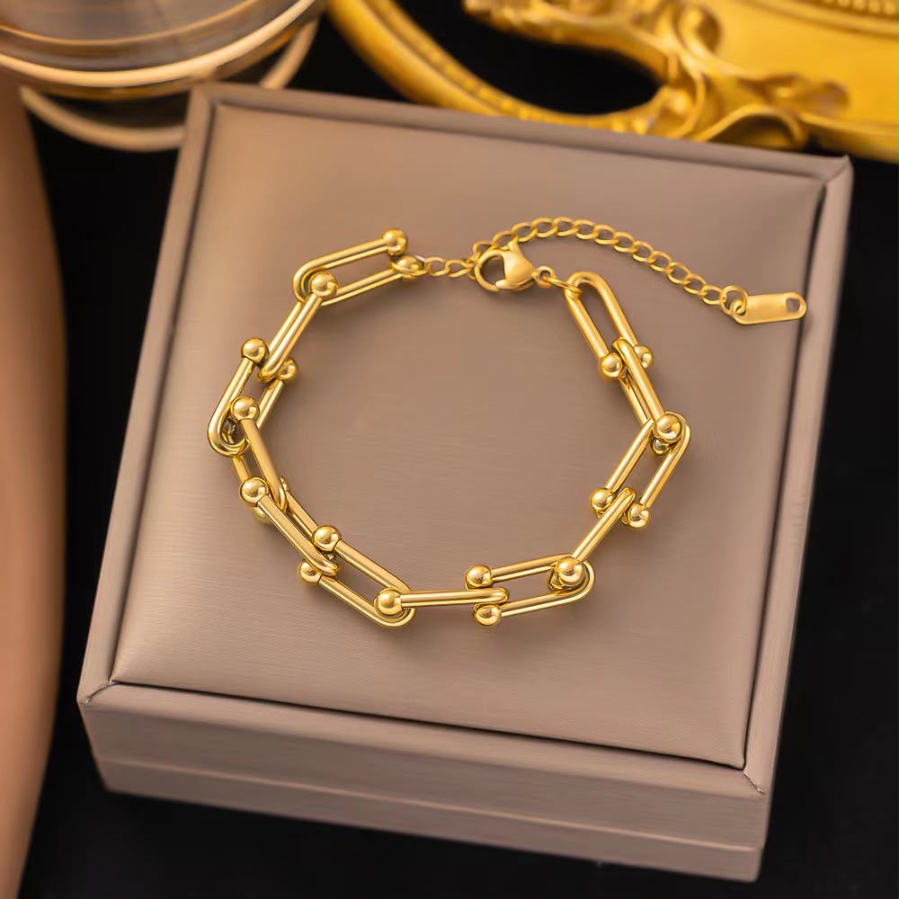 Pulsera dorada elegante