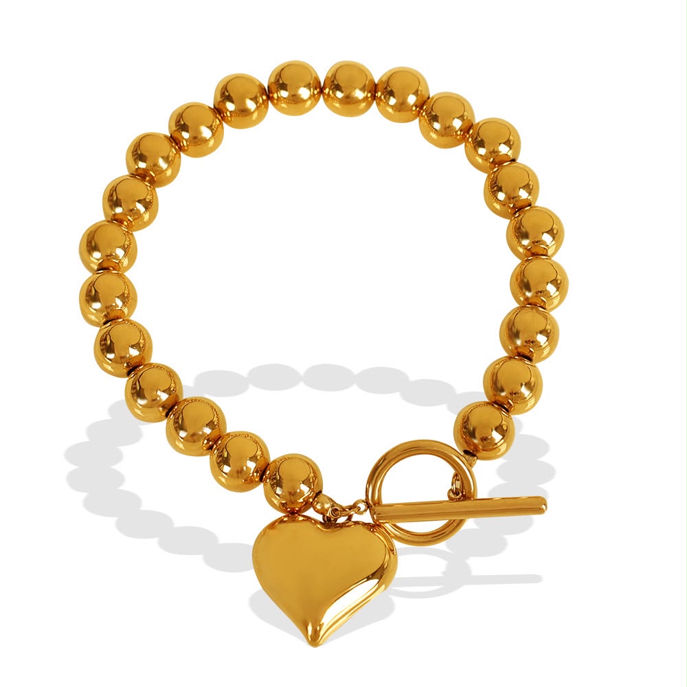 Pulsera de esferas doradas