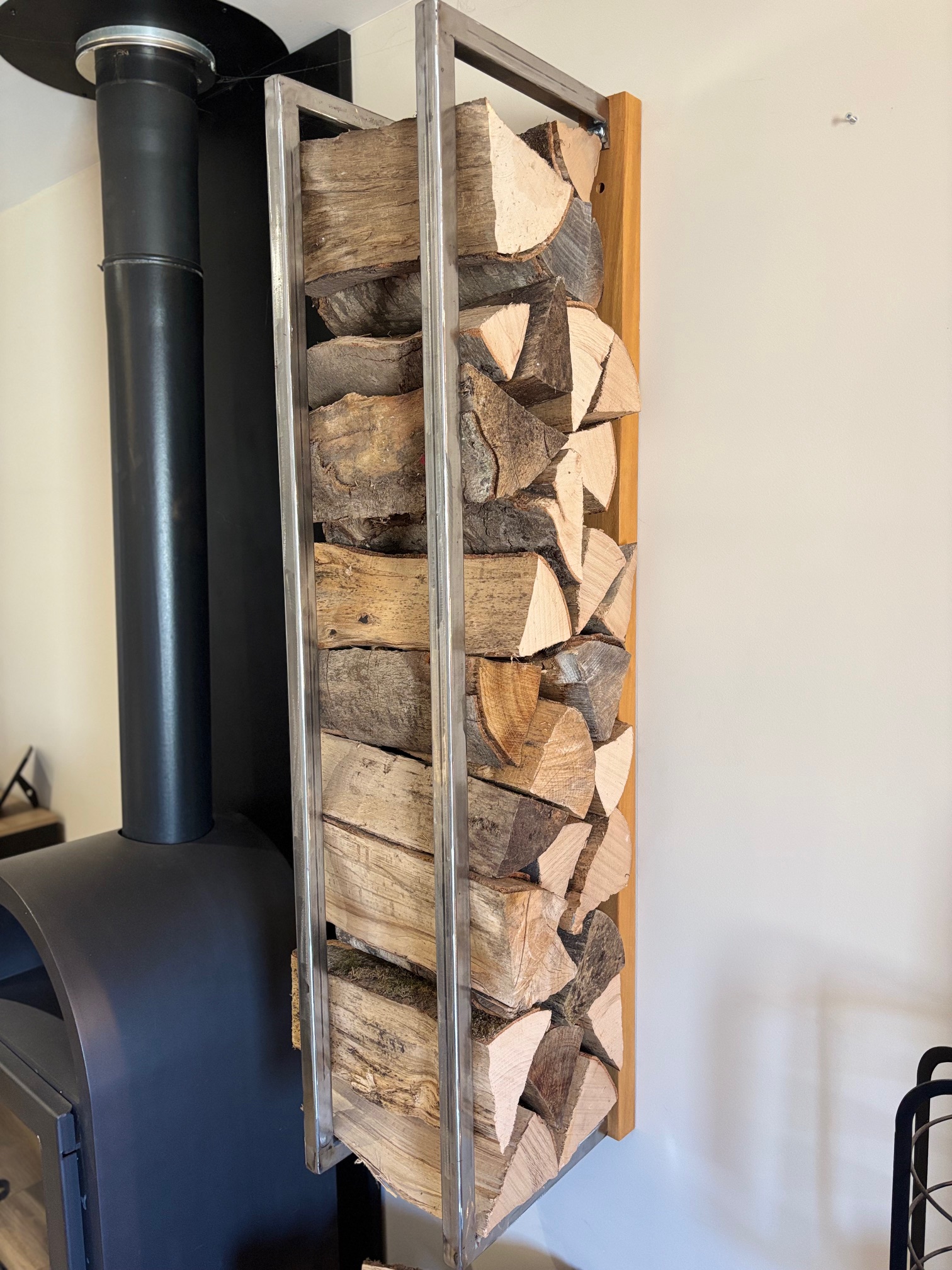 Support à Buches en acier brut : " L'éternel "