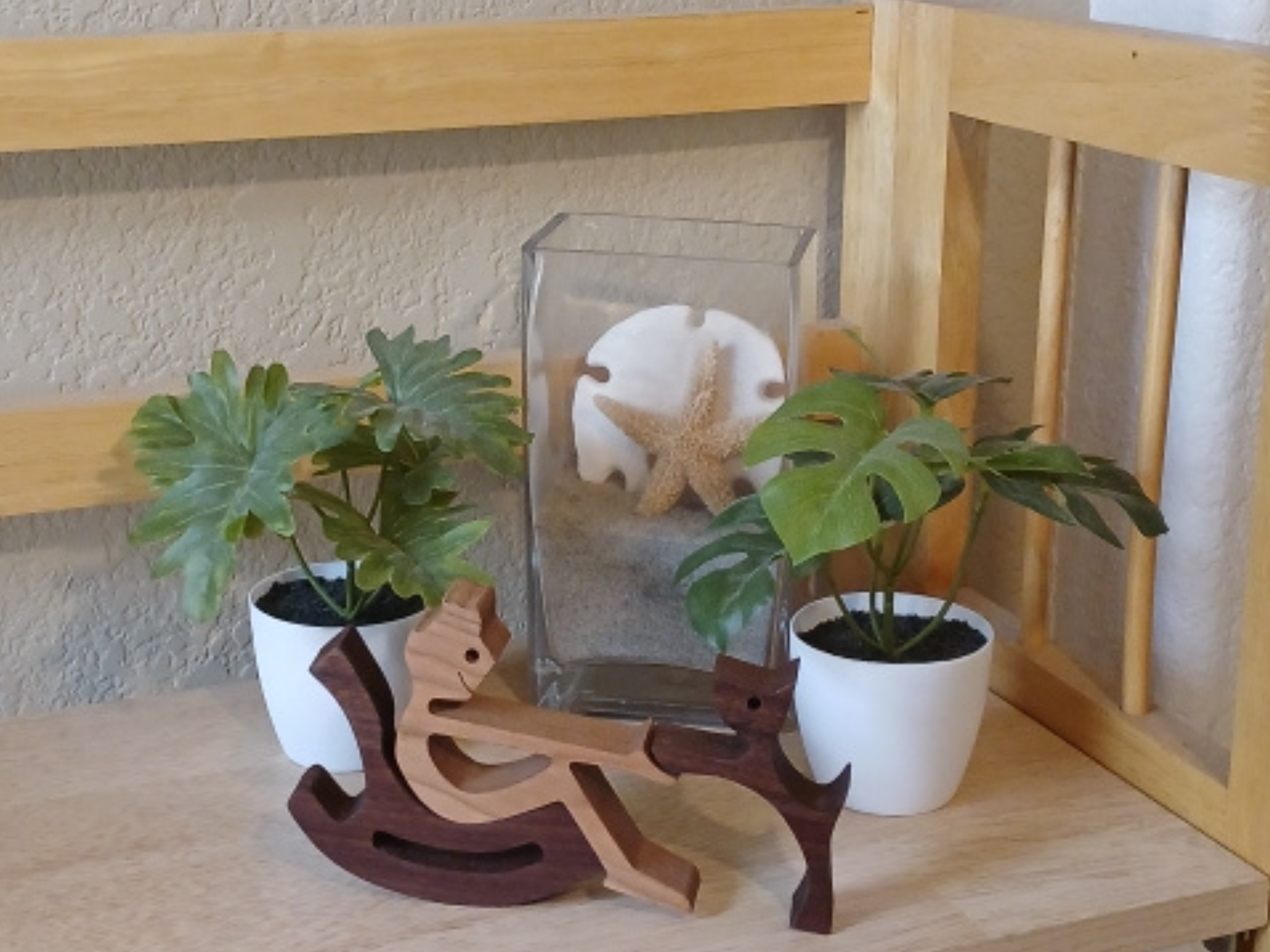 Wooden Boy in Rocking Chair with Beloved Pet