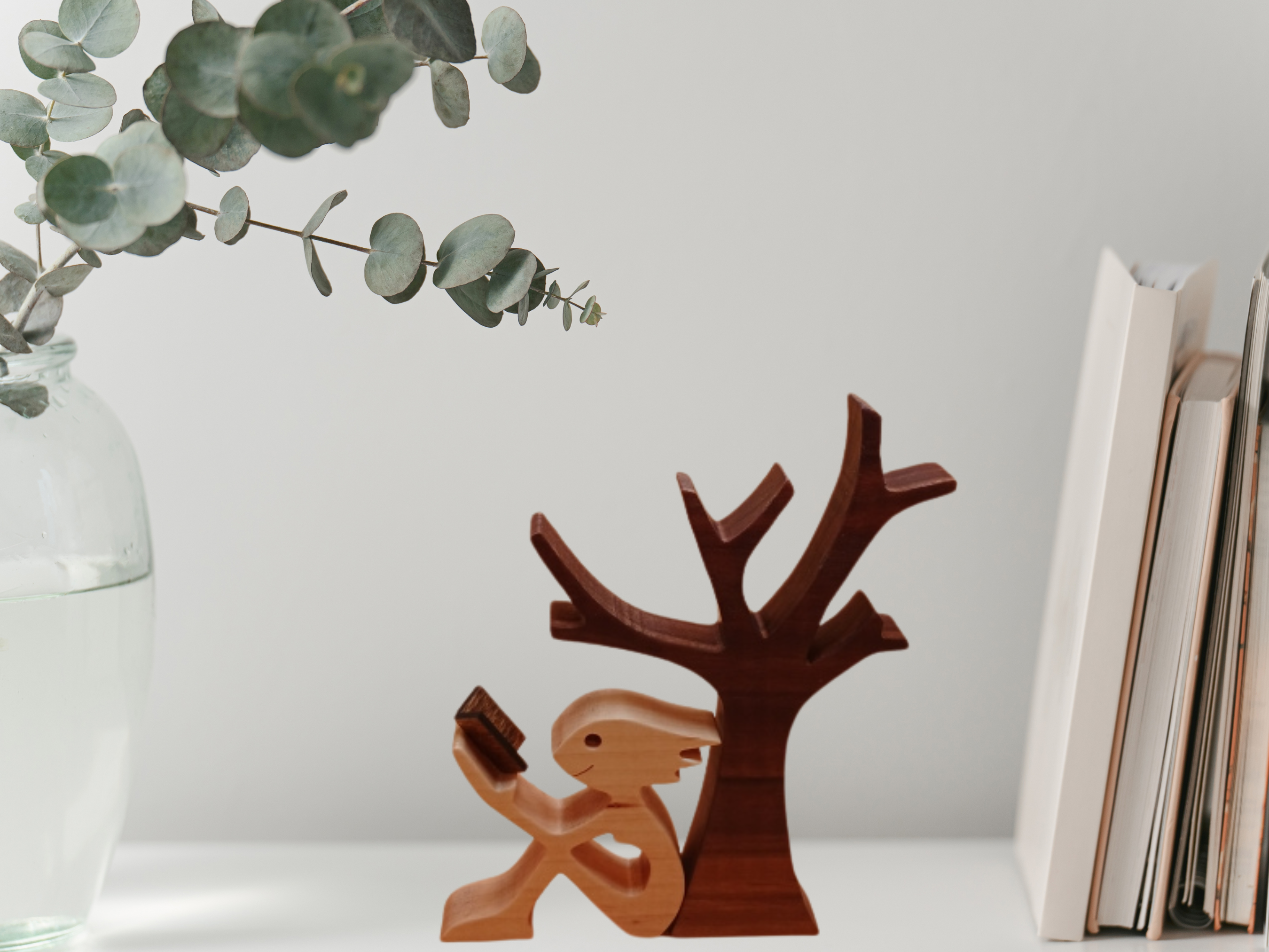 Handcrafted Figurine of a Woman Sitting by a Tree Reading a Book 