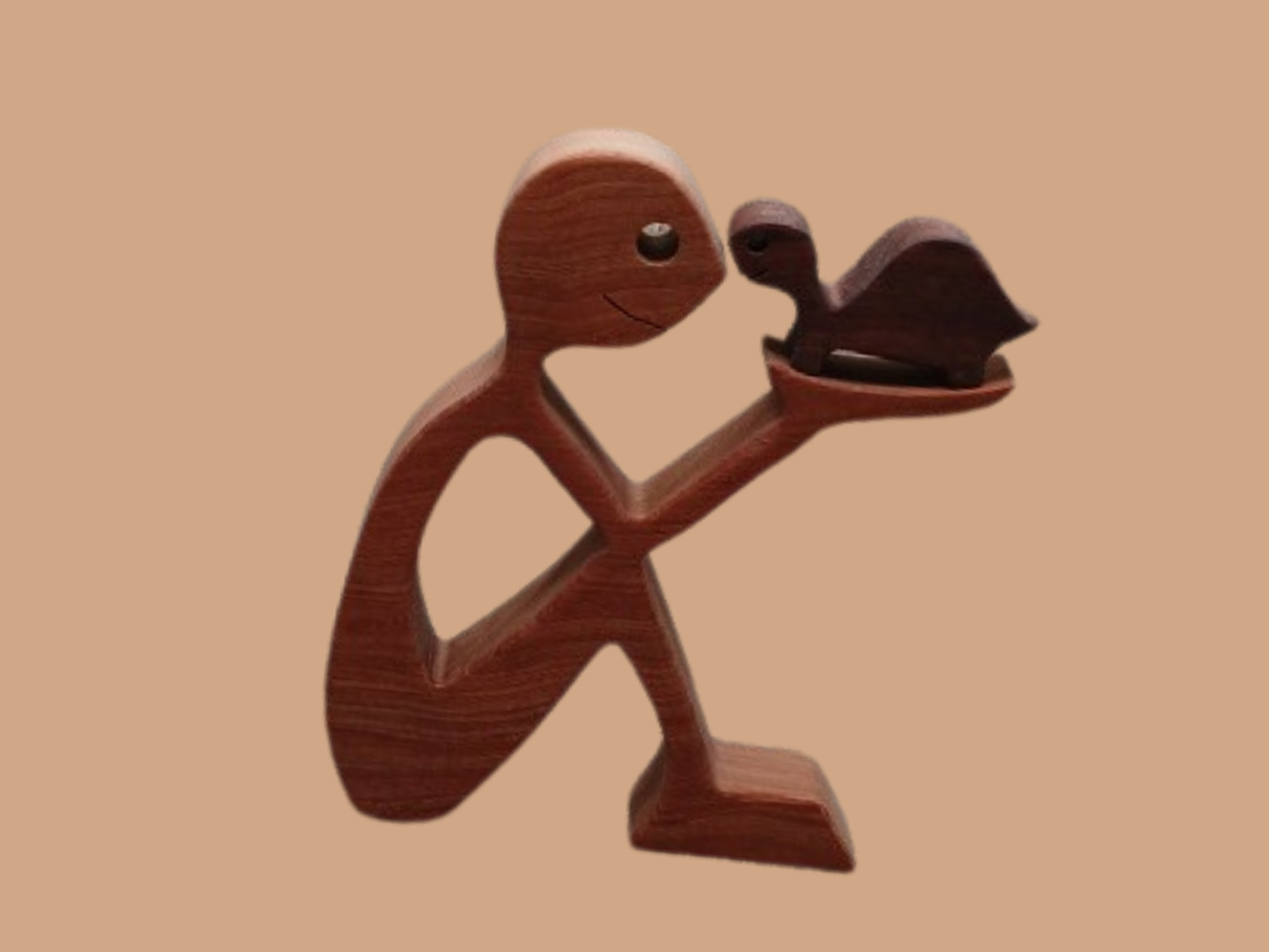 Man Holding Turtle Figurine