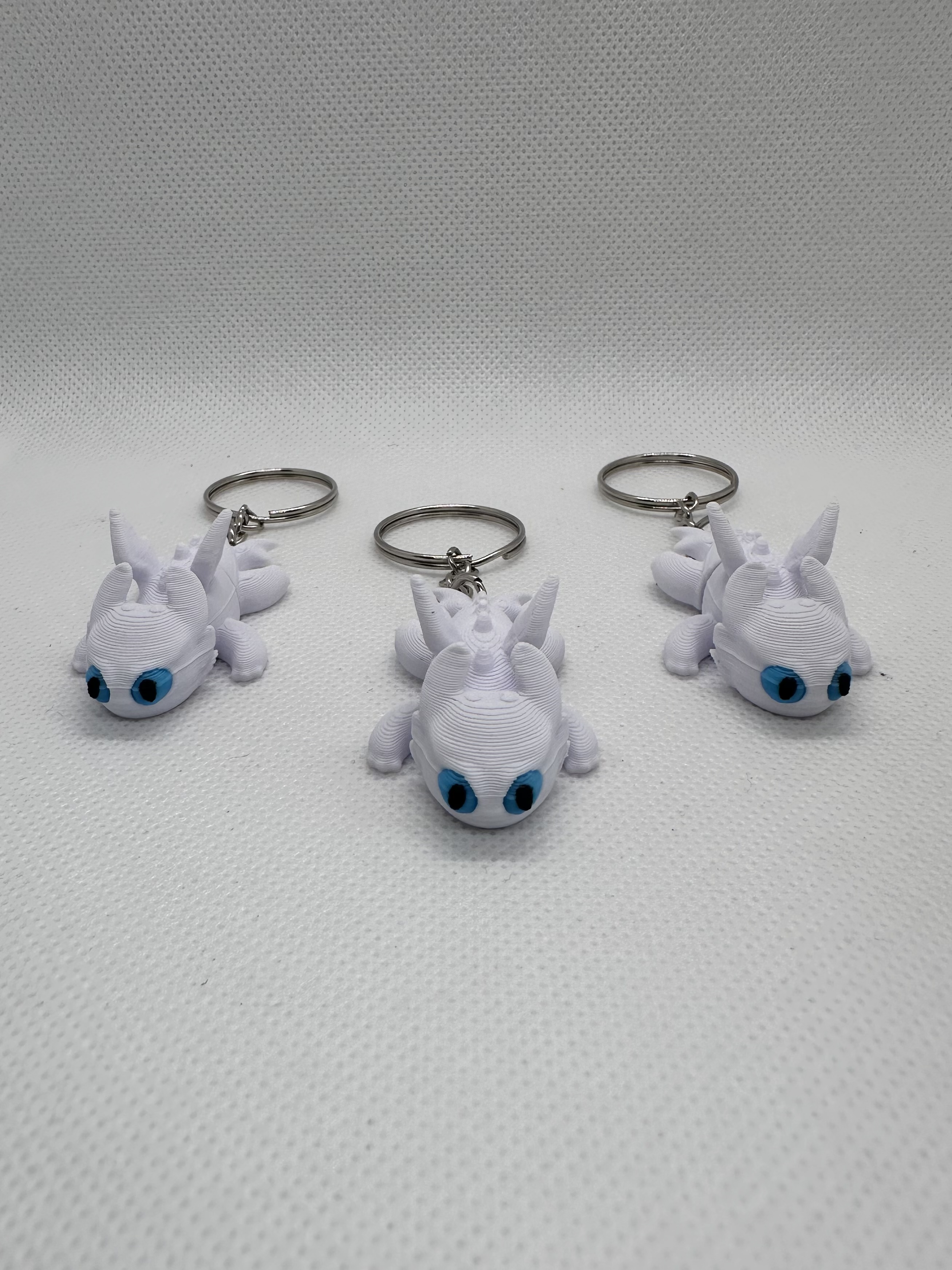 Flexi sleutelhanger Draak wit