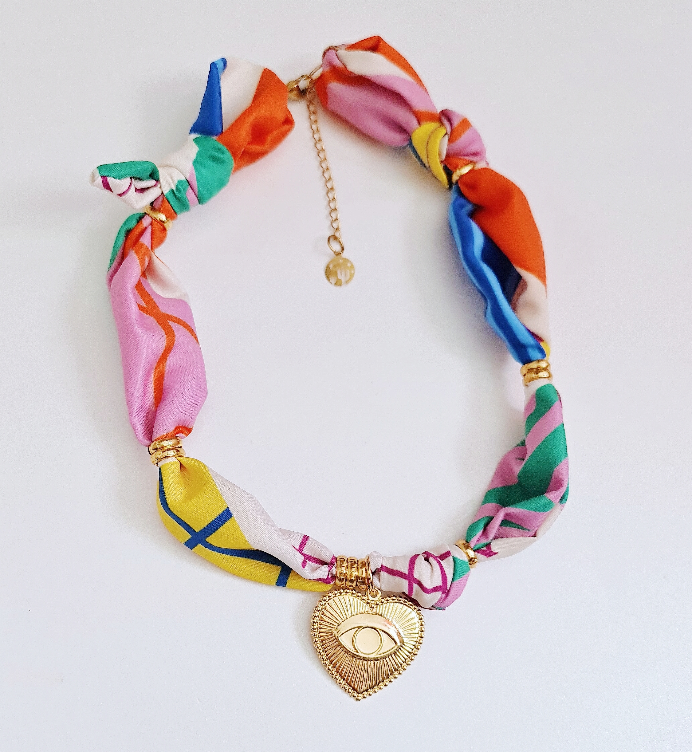 Collar tela dije ojo
