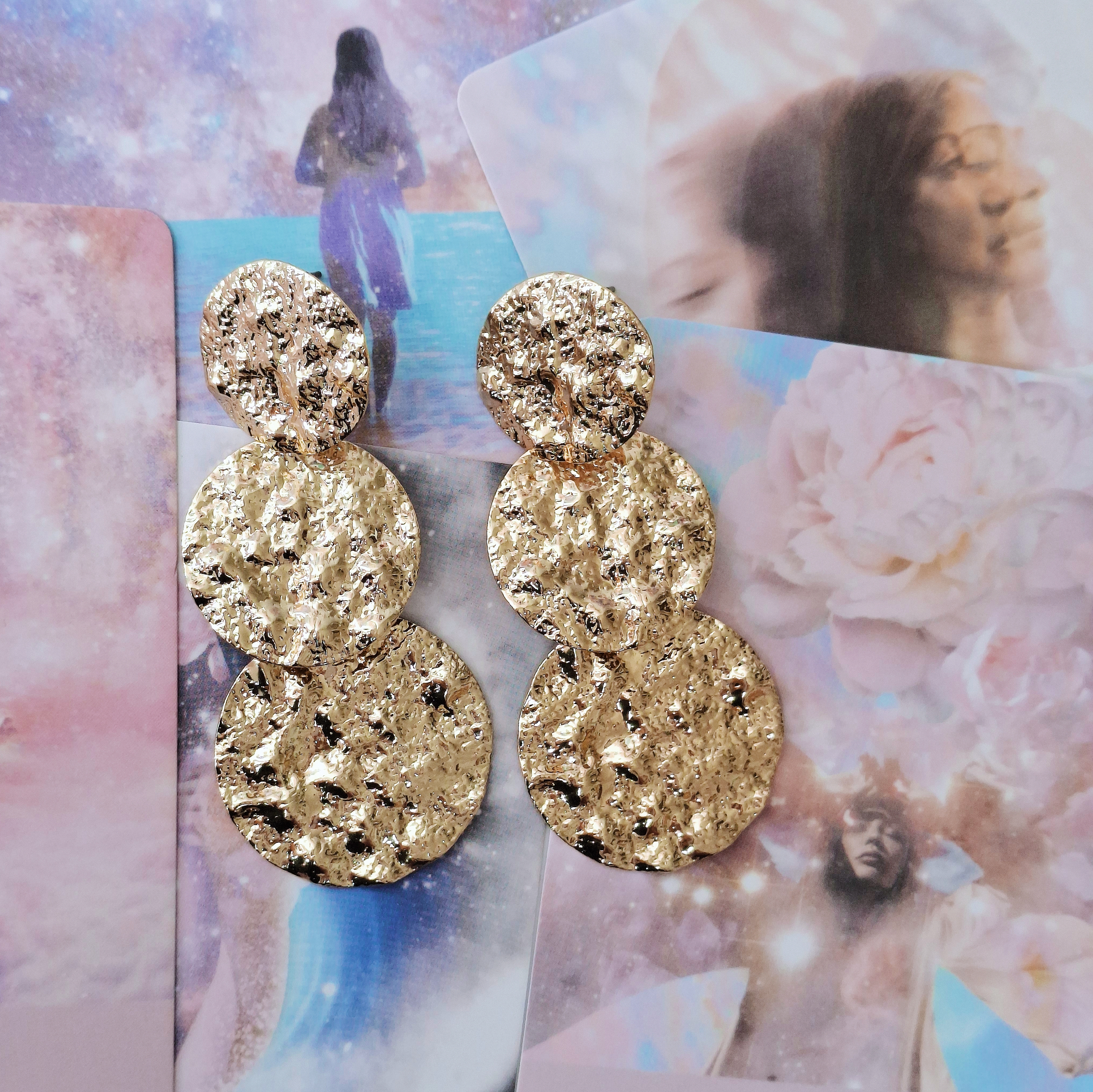 Aretes textura  martillada  