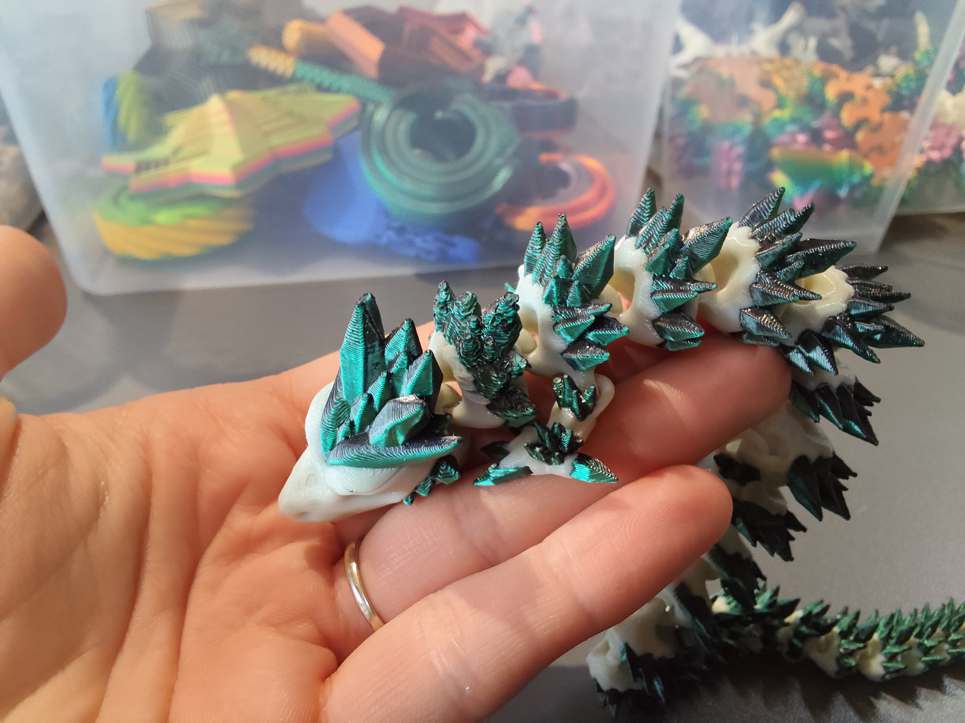 Drakoniukas balta/žalia su defektais