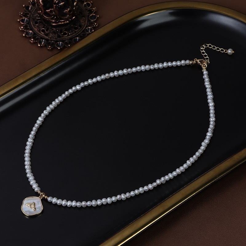 Pearl Necklace with Heart Pendant