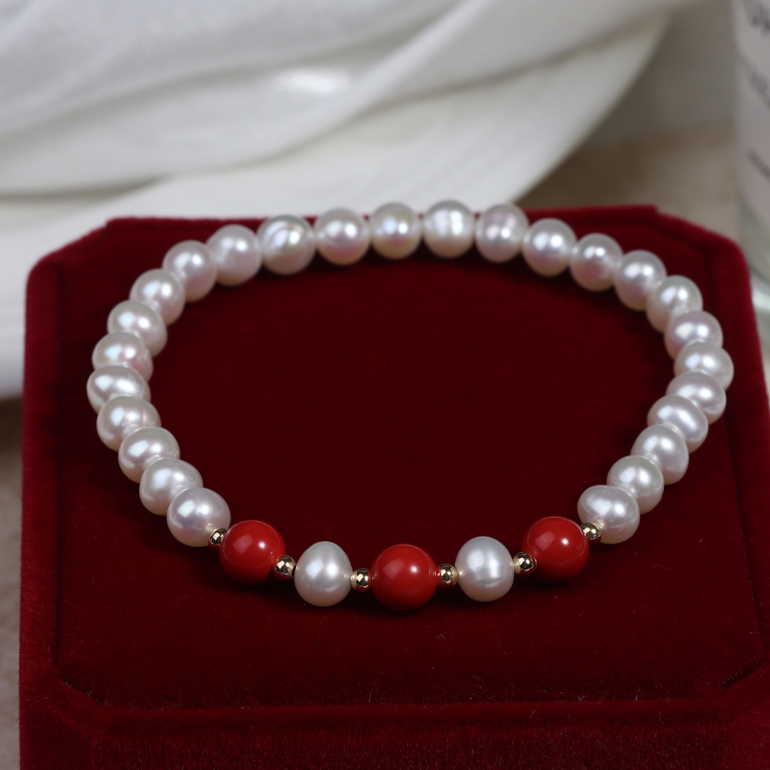 Elegant Pearl and Red Bead Bracelet