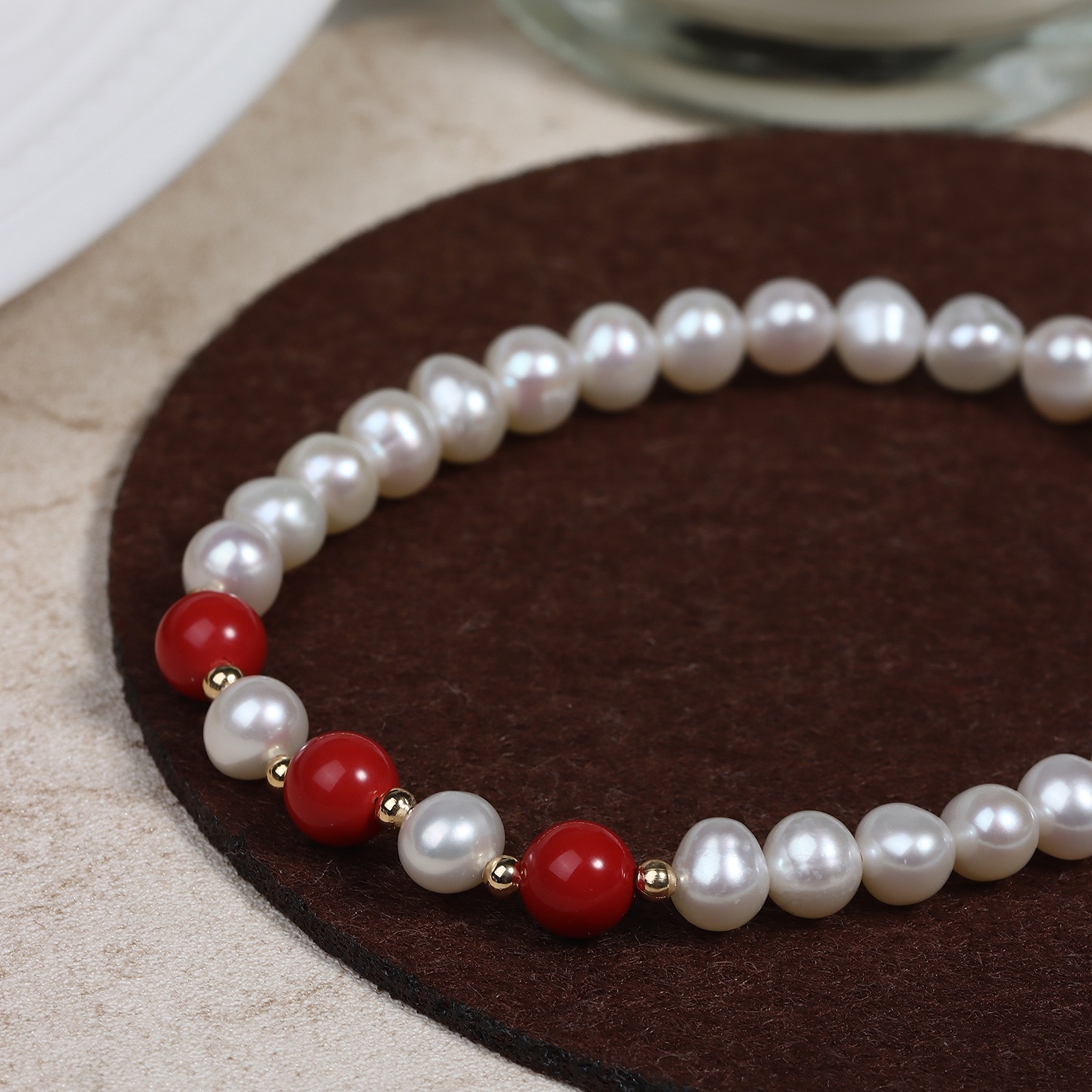 Elegant Pearl and Red Bead Bracelet