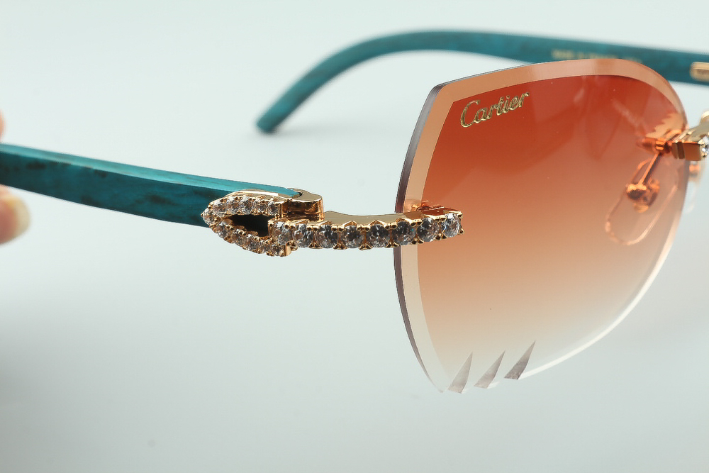 Diamond Teal Carti Woods Sunglasses (Orange Butterfly Lenses) 
