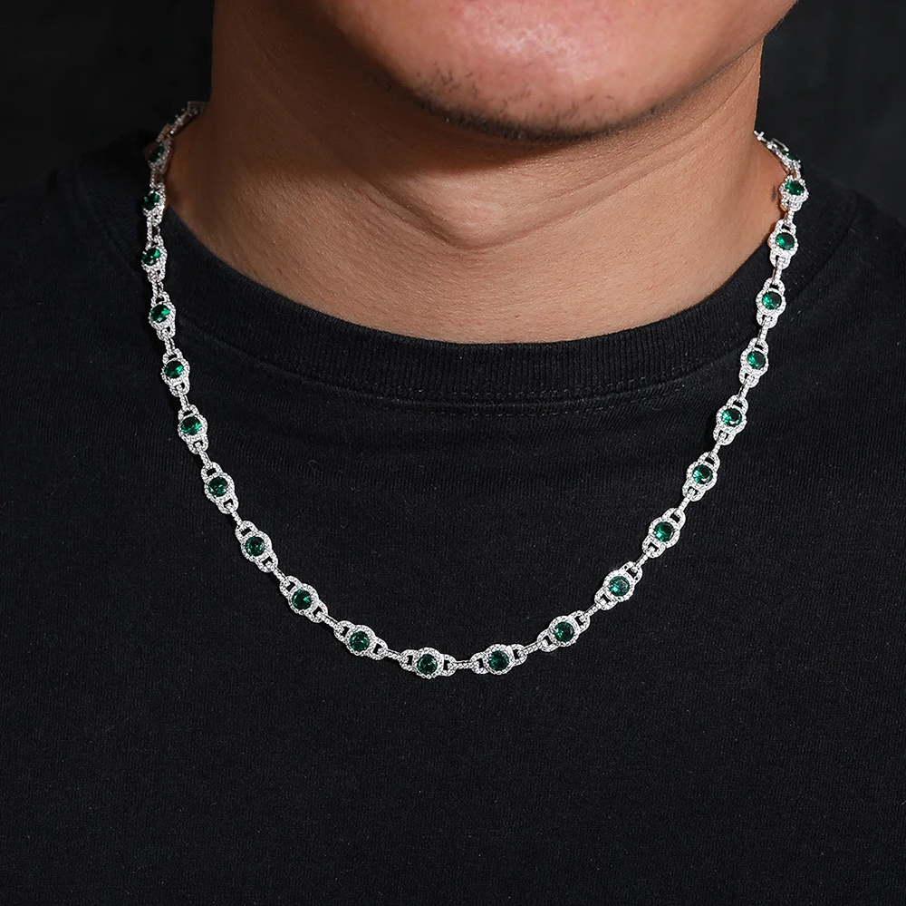 The Zaire Chain™ – 7mm Cuban Link with Emerald Green Moissanite Center Stone & VVS D Color Accents in 925 Sterling Silver